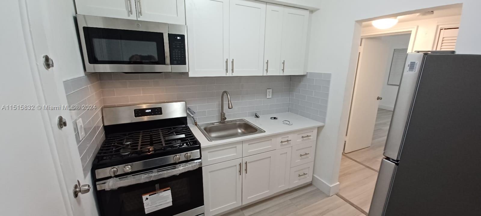 Location, Location, Location...Beautiful 1bedroom + Den + 1 bathroom completely renovated (quartz countertop), very comfortable. The apartment has been designed to maximize space and light with Private backyard. Washer/dryer on site. Great area! South Beach has the bustle, the energy, the vibrant sense of adventure — but only a few short miles away, North Beach has the relaxation and the escape.This private building is centrally located just a few blocks from the beach, major transportation, dining and entertainment.
