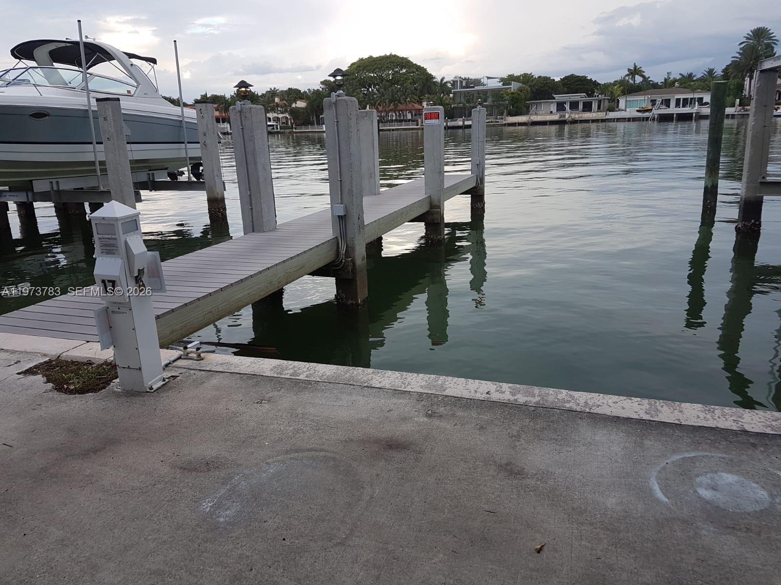 Rare deeded boat slip in a premier Mid-Beach location at 5401 Collins Ave. This well-maintained slip accommodates vessels up to 40 feet and offers direct Intracoastal access with no fixed bridges to the ocean. Water and electricity are included at the dock. Exceptional convenience for boat owners with public parking located just 200 meters away. A perfect opportunity for secure, private dockage in the heart of Miami Beach, on Millionaires' Row!."