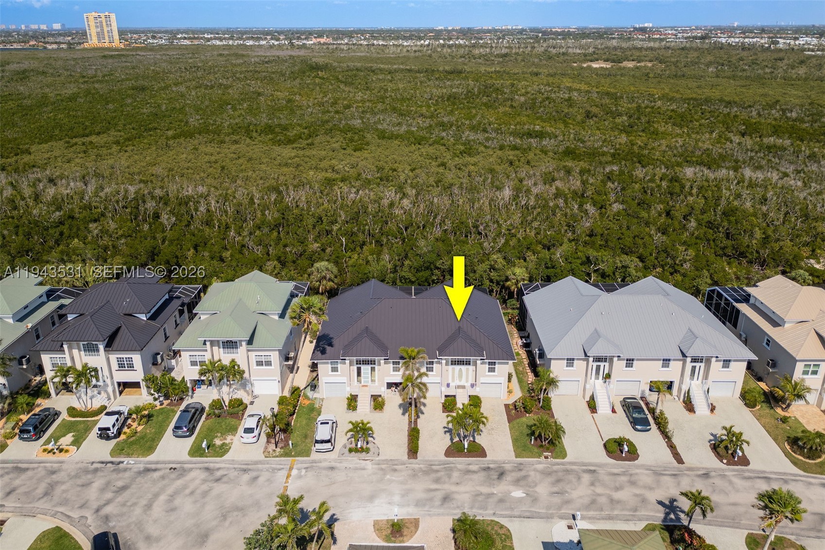 Best-priced concrete block (CBS) waterfront villa in Fort Myers Beach, located in the desirable Old Pelican Bay community and offering the rare advantage of TWO docks. This hurricane-proven, two-story villa sustained no hurricane damage, with all main living areas elevated on the second floor for added protection, views, and coastal breezes. Recent upgrades include a 2024 metal roof, 2024 HVAC, 2023 hot water heater, and 2023 pool equipment, plus a 1-year home warranty. The light-filled open layout features serene water views, a private primary suite, guest bedrooms with ensuite baths, an upstairs balcony, and a private pool. Dock #16 includes a 10,000-lb boat lift, offering easy Gulf access for boating and fishing, while a transferable flood policy (~$1,200/year) enhances affordability. Just minutes from Fort Myers Beach, dining, shopping, and entertainment—this is a rare opportunity to own a durable, low-maintenance waterfront villa with exceptional value.