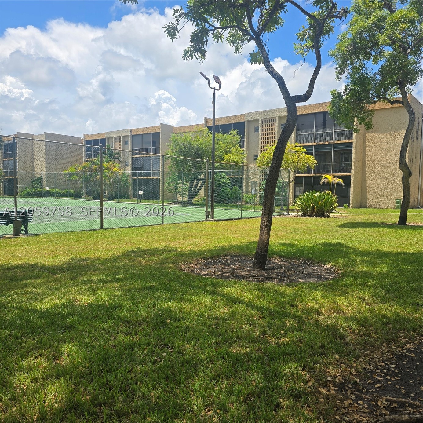 Brand new floors and freshly painted!  Kitchen features new oven and dishwasher.   Tranquil view of pool and tennis court.  Closest parking to elevator! The owner has loved this unit for over 50 years and hopes you'll love it too!