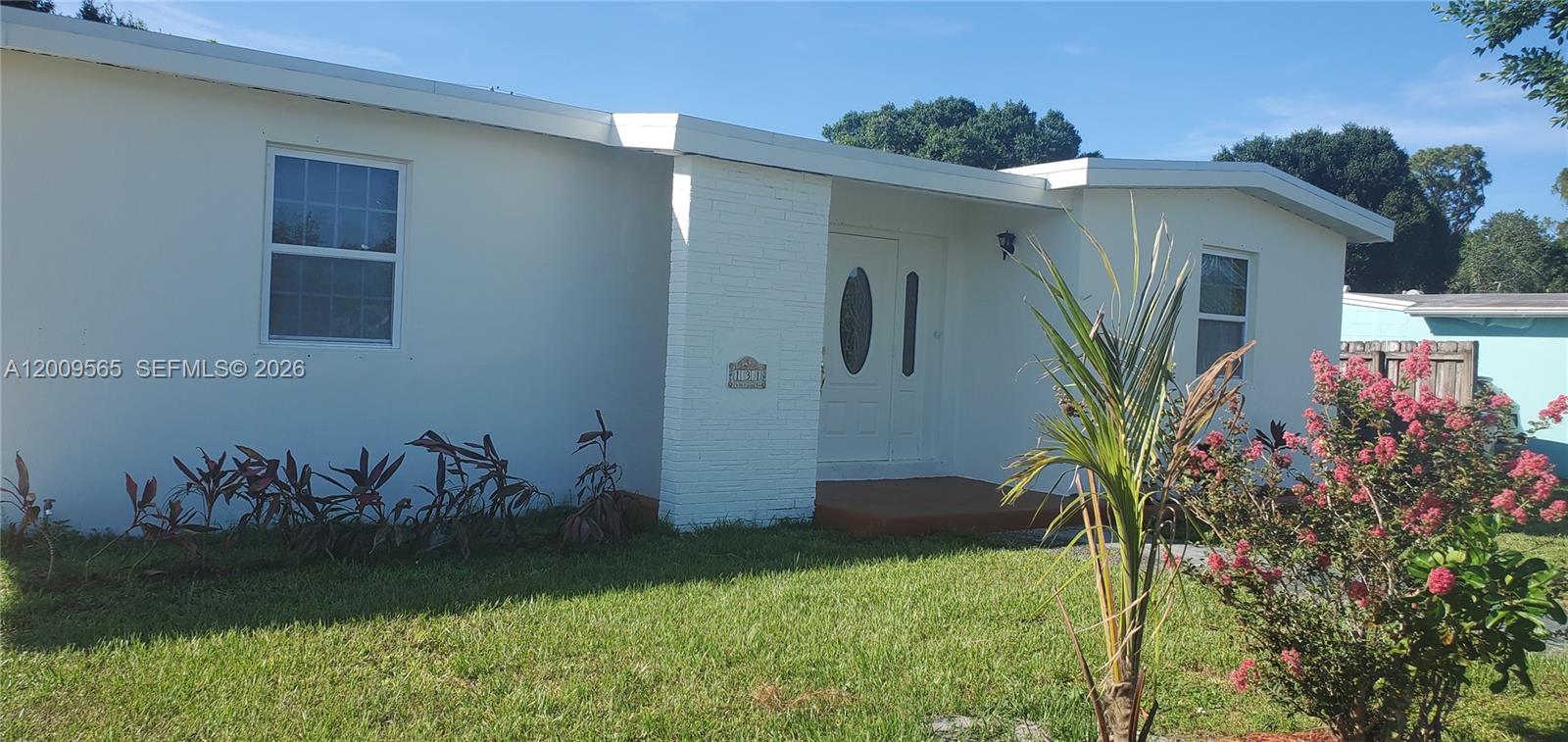 This solid concrete block house has 3 bed 1 bath single house has impact windows upgraded kitchen with plenty of cabinets and countertops. A carport to park your vehicle 2022 roof; , laundry inside huge backyard for barbecue and fence throughout property