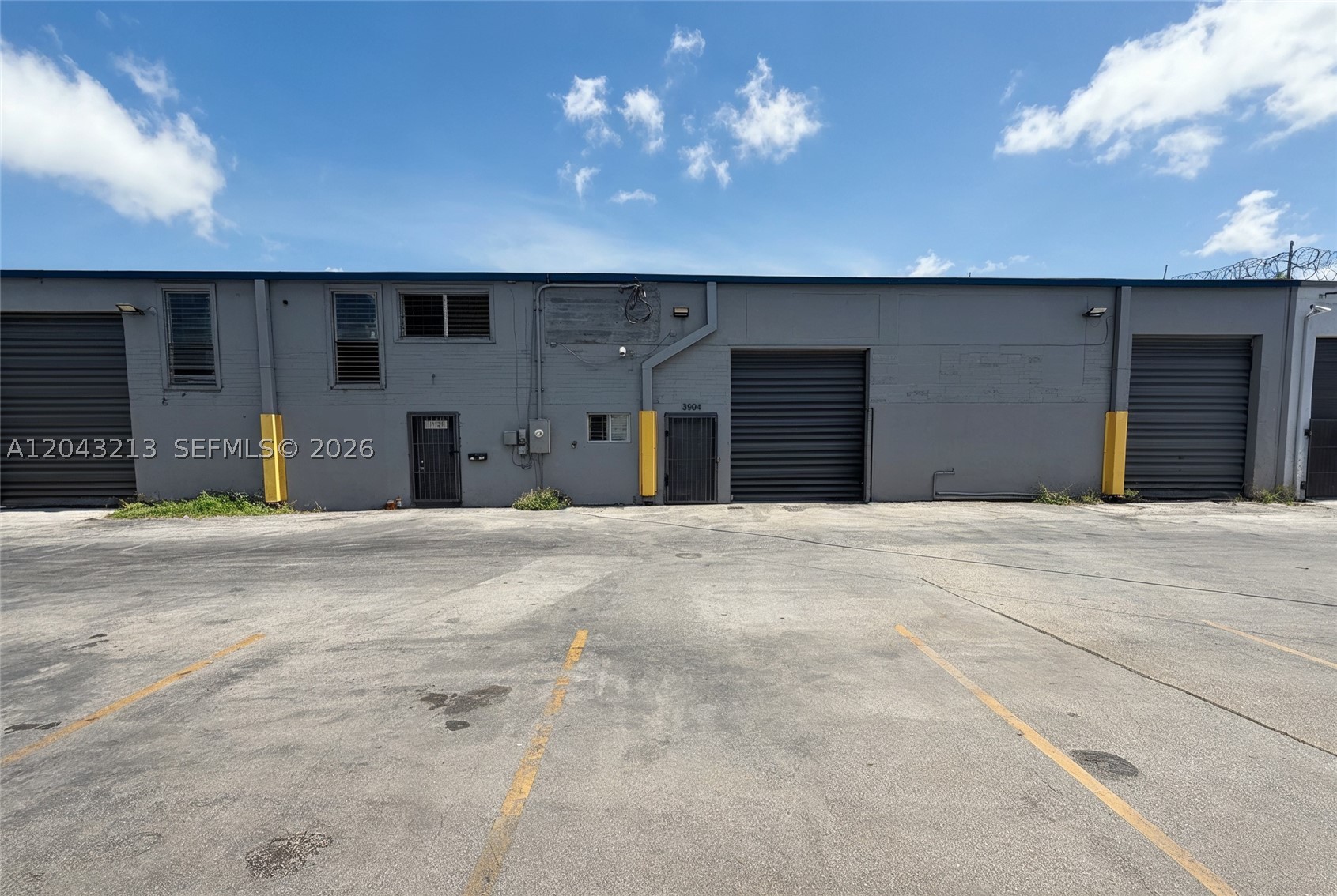 3904 NW 32 Ave presents an outstanding opportunity for an investor or owner-user to acquire a ±11,000 SF industrial building conveniently located just off Florida State Road 112. The property offers excellent accessibility to major transportation corridors and is available at a highly competitive basis within a strong industrial market. The building features three loading doors, three-phase power, and a durable concrete roof in good condition, providing the infrastructure necessary for a wide range of industrial, warehouse, distribution, manufacturing, and service-related uses. Its flexible layout allows for easy division into two separate units, creating multiple occupancy and leasing options. An owner-user can occupy the entire facility or lease a portion of the building to generate supplemental income and offset operating expenses. For investors, the property presents a compelling value-add opportunity with a clear path to stabilization and projected NOI of approximately $174,800. The combination of functional industrial features, flexible configuration, strong accessibility, and income potential makes this property an attractive acquisition in a supply-constrained South Florida industrial market. Ideal for businesses seeking operational flexibility or investors pursuing stable cash flow and long-term appreciation.