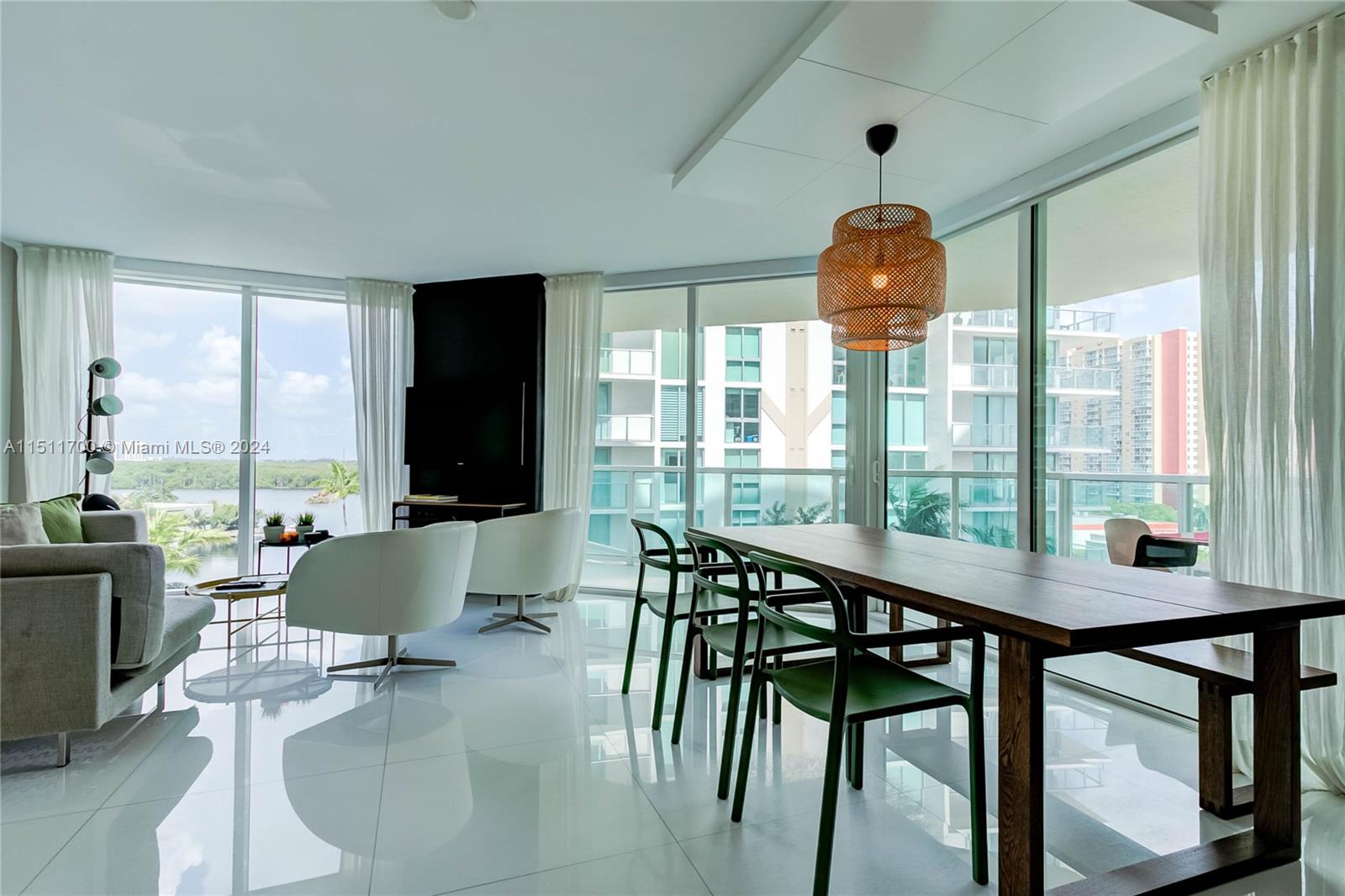 LOCATION! LOCATION! Beautiful 3 bedrooms & 2 baths unit located steps away from the beach with an amazing bay, skyline and sunset views! Floor to ceiling sliding doors, spacious wrap around terrace off the living and bedrooms.  Porcelain flooring throughout, gourmet kitchen w/ European cabinets, quartz countertops, SS appliances. The master bedroom offers an oversized walk in closet and bathroom. Side by side washer and dryer. Building offers resort-style amenities: BEACH SERVICE, pool, gym, valet & clubhouse.
