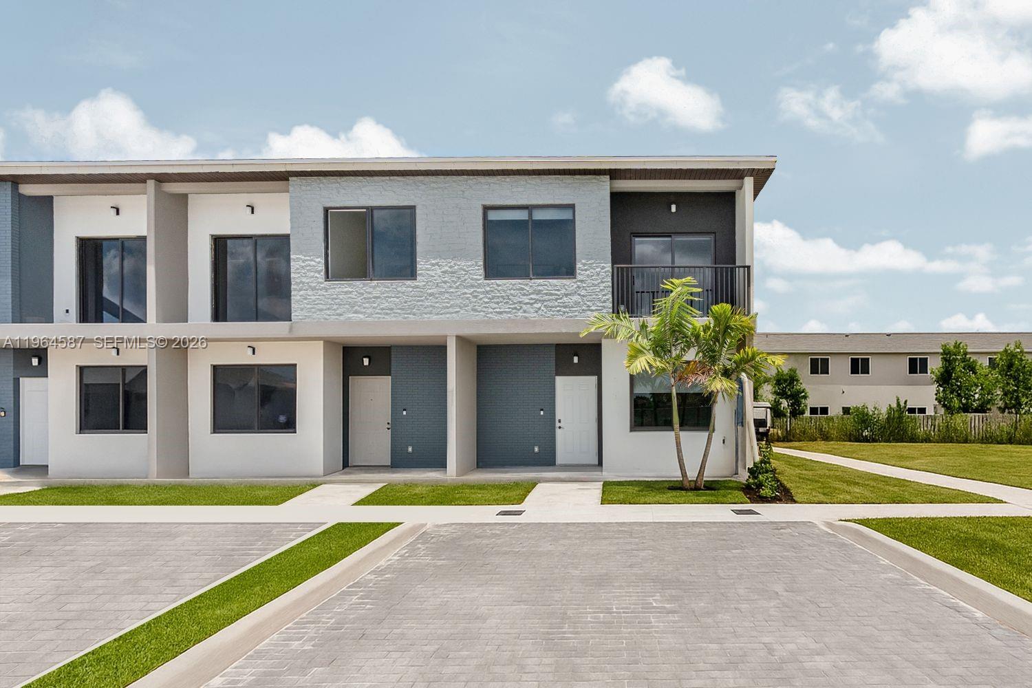 MOVE IN READY! - GET LOW RATES AND CLOSING COSTS CREDITS Home is right in front of community park! Direct access to beautiful park for kids and the family. Welcome to On Centro, a new townhouse community built tough with Onx’s exclusive Pure Concrete X+ Construction, now even better with Fortified Certification for extra savings and peace of mind! Your Collection N Home features 4 bedrooms (one bedroom on the first floor), 3 bathrooms, a stylish kitchen with an island, hurricane impact windows and doors, and porcelain tile flooring, quartz countertops, and stainless-steel appliances. Live in an intimate neighborhood inside the Onx Community, just steps from a 7-acre central park with football fields, beach volleyball, a kids’ playground, soccer fields, BBQ grills, and more! Enjoy easy access to US-1, Florida’s Turnpike, Krome Avenue, the Florida Keys, and top schools, parks, shopping, and dining in Homestead.