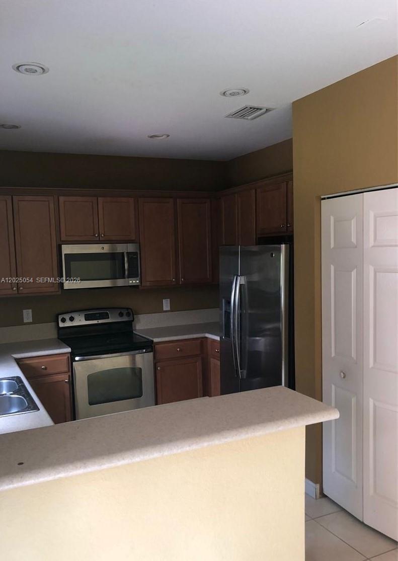 CENTURY GARDENS AT TAMIAM - Residential Lease
