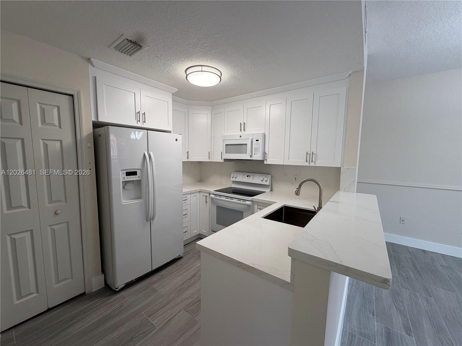 THE GATES AT DORAL ISLES - Residential Lease