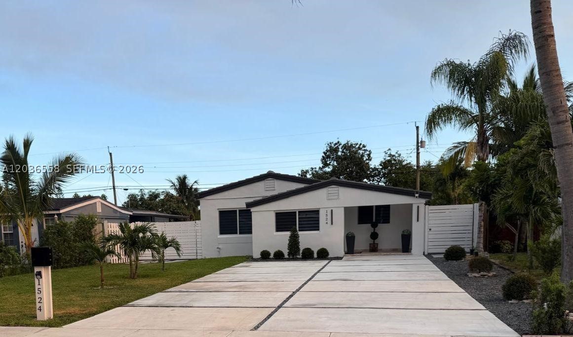 This beautifully remodeled residence located in North Miami Beach offers three bedrooms and two bathrooms and sits on an expansive lot with generous front and backyard space, creating a wonderful setting for outdoor living and entertaining, with room for a pool.
The home features impact windows and doors throughout. The lush backyard is enhanced by a mature avocado tree, providing natural shade and a touch of South Florida's tropical lifestyle. The spacious lot offers privacy and plenty of room to enjoy the outdoors.
Ideally located within a highly regarded school district, the property is just minutes from Aventura Mall, major hospitals, houses of worship, and some of the area's finest shopping, dining, and entertainment destinations. Combining modern updates with a prime location, this home offers comfortable living in one of North Miami Beach's most desirable neighborhoods.
