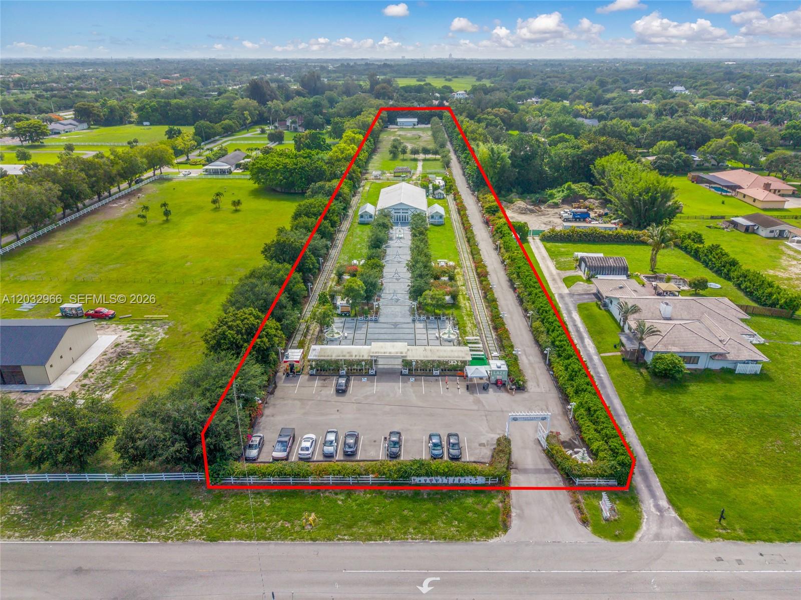 Cielo Farms benefits from BCPA and VAB-confirmed agricultural classification with retroactive effect to January 1, 2021, and is further strengthened by Florida Senate Bill 290 (effective July 1, 2026), which expressly prohibits local governments from restricting agritourism activities on agriculturally classified land — eliminating municipal permitting risk that burdens competing venues.

The estate features bougainvillea-lined garden walkways, Parisian lamp posts, stone pavers, architectural fountains, covered pergolas and trellises, a chickee/petting farm area, and a long private drive creating a dramatic sense of arrival. Published event pricing ranges from $5,000 (Mon–Thu) to $7,500+ (Fri–Sun) with capacity for 125–200 guests.

Investment highlights
Cielo Farms is a 4.95-acre, family-owned agritourism estate and event venue located in the heart of Southwest Ranches, Broward County's premier equestrian and agricultural enclave. The property operates as a full-time bougainvillea nursery with an established agritourism event infrastructure — anchored by a 5,000 SF custom white barn featuring air conditioning, a performance stage, dual bar service areas, prep kitchen, sound insulation, balcony, and A/C restrooms.