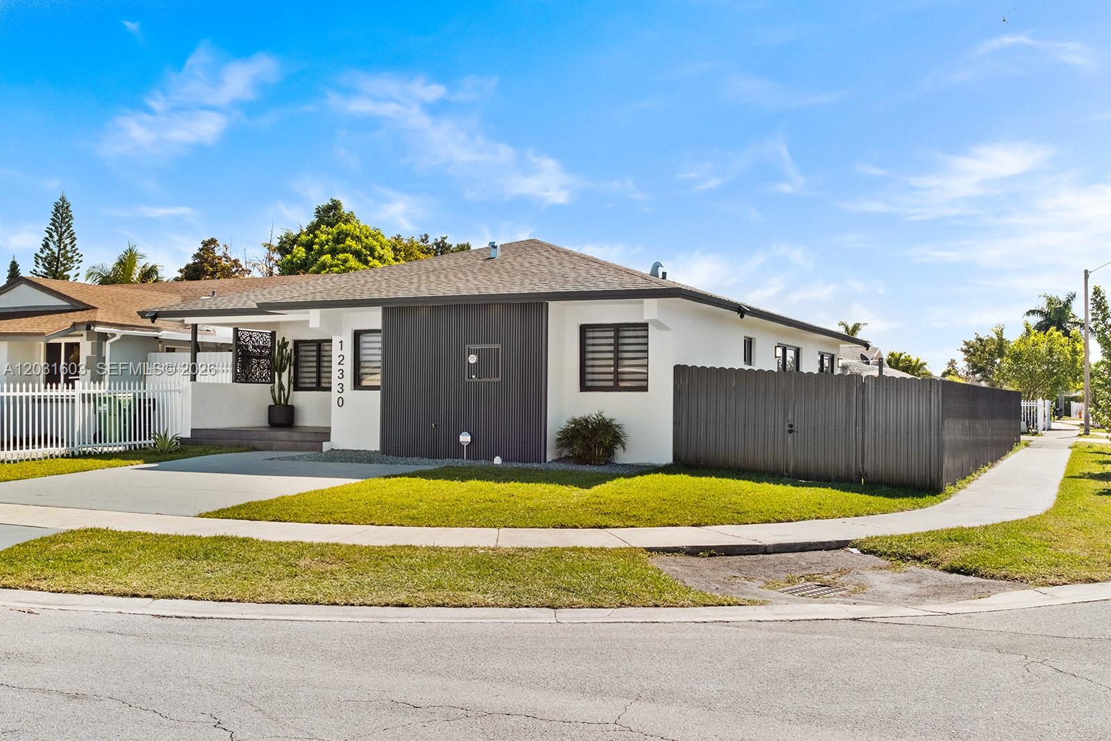 SELLER OFFERING CREDITS TOWARD BUYER’S CLOSING COSTS OR RATE BUYDOWN! Fully Rebuilt to 2026 Codes — Move-In Ready, New-Construction Quality! Why wait 12–18 months for a builder when you can move into a brand-new home today? Located in an established neighborhood with NO HOA, this stunning 4-bedroom, 2-bathroom, 1,800+ sq ft home has been completely reconstructed from the ground up. This is NOT a cosmetic flip — this is a true, fully permitted rebuild approved under the strictest 2026 Florida Building Codes. Every single component is 100% BRAND NEW: Structure & Shell: Fully rebuilt to modern engineering standards. Protection: High-impact doors and windows throughout. Systems: Brand-new roof, plumbing, electrical, and high-efficiency HVAC. Peace of Mind: Elevated to current FEMA flood zone standards, meaning significantly lower insurance premiums and long-term protection. Inside, you’ll find a bright, open-concept layout with premium contemporary finishes designed for modern living. Every detail has been engineered for maximum safety, energy efficiency, and durability. * $ credits for closing costs or to buy down your interest rate. * Recent appraisal and elevation certificates are available upon request. Act fast—new construction quality at this price point in Miami is extremely rare. Showings by appointment only. Schedule your private tour today!