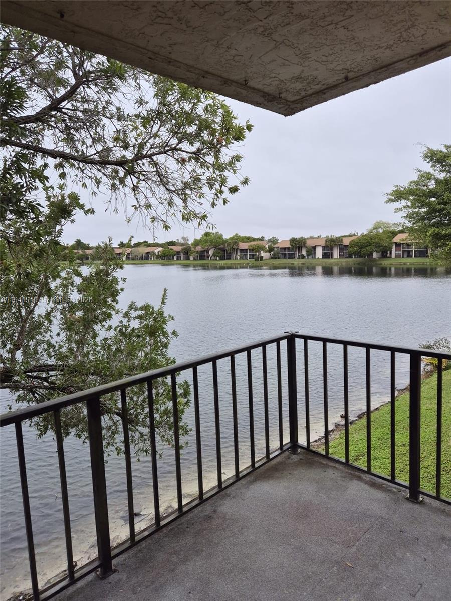 Spacious 2 bed / 2 bath condo centrally located in the heart of Sunrise. Features a large screened terrace overlooking the canal, remodeled kitchen with stainless steel appliances, two assigned parking spaces, and new washer, dryer, and water heater. Water included in HOA fees. Investor-friendly with no rental restrictions. Conveniently located near major highways, shopping, and dining. A must-see! Perfect for investors. INVESTOR ONLY. Property is rented  for $2,200 until April 2027