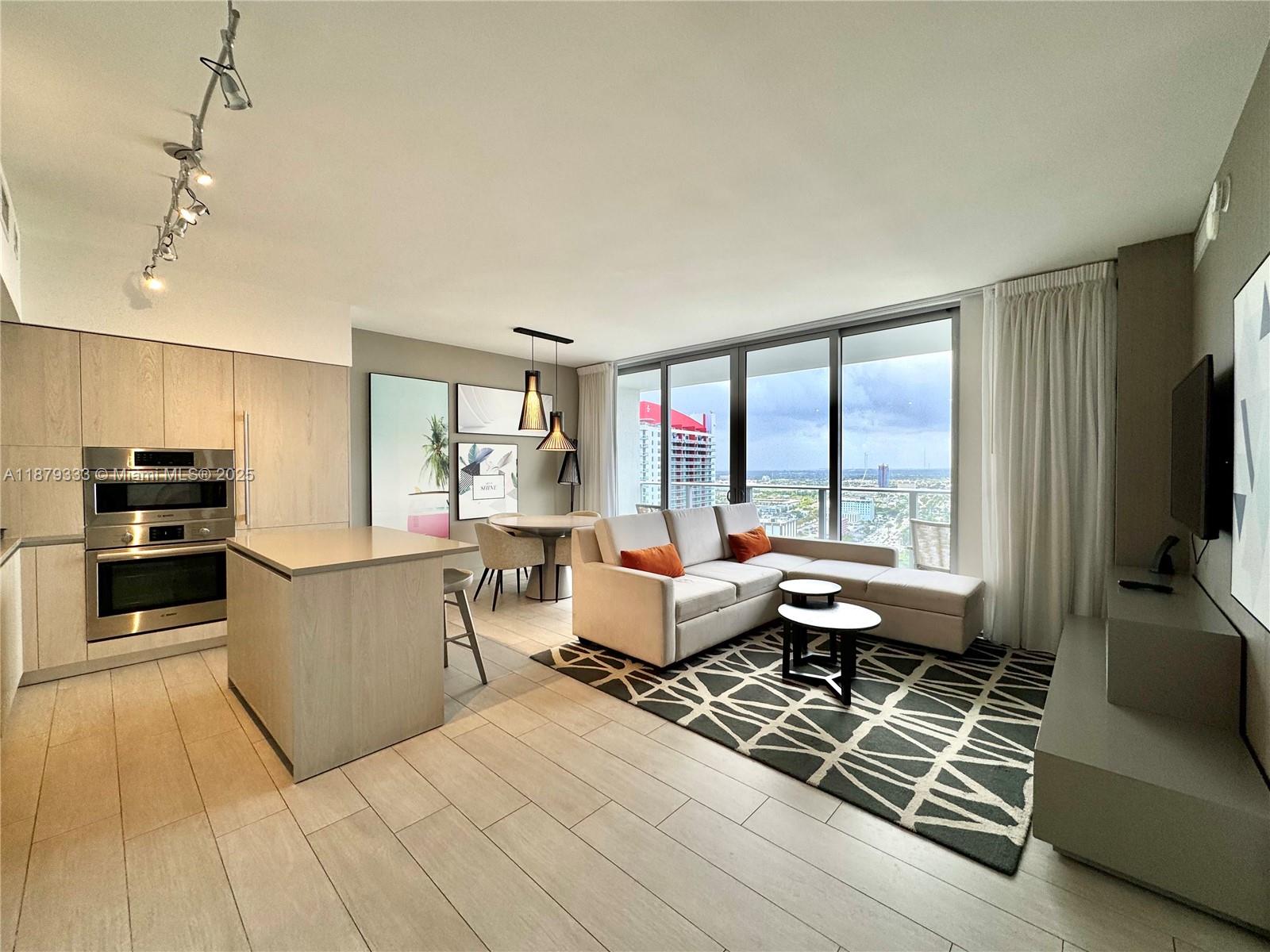 PRICE TO SELL!!! BIG OPPORTUNITY IN HYDE BEACH HOUSE!!! DAILY AIRBNB ALLOWED. Income producing condo-hotel unit. Fully furnished with curtains , washer and dryer, personal closet inside the unit. Full living area with integrated kitchen in the best contemporary style with 1 full sofa bed. Five star amenities offer private beach club: lounge chairs, towels &umbrella & ocean access. 24 hour concierge and valet parking, jacuzzi, bar, grill, poolside food and drinks, cabanas, spa, outdoor tennis court and movie theater, racquet and basketball court.