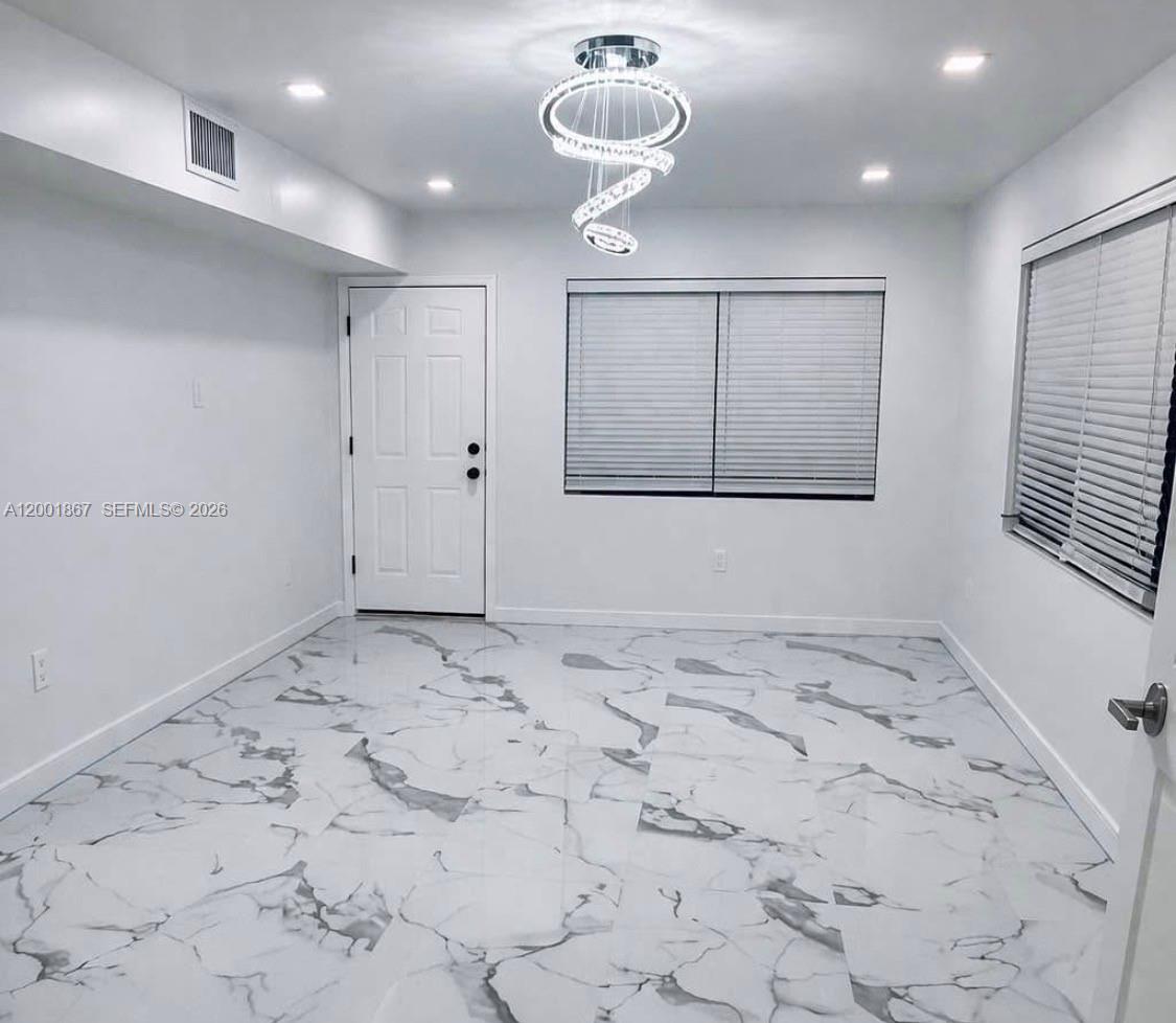 Excellent investment opportunity! Beautifully remodeled income-producing property! This unique duplex features 3 independent units, including a spacious 2/1 and 1/1, and a separate studio, offering flexibility for investors or owner-occupants. Both main units have been fully updated with elegant marble floors, modern appliance, and abundant natural light throughout, creating a bright and inviting living space.  
Unbeatable location just 2 blocks east of Federal Hwy and minutes from Downtown and Hollywood Beach.
 This is a true value-add opportunity for investors for long-term hold. The property offers strong potential for rental growth and long-term appreciation in a rapidly improving neighborhood. Please review the offer memorandum for neighborhood trends, lease analysis and sales grids. Don't miss this incredible opportunity!