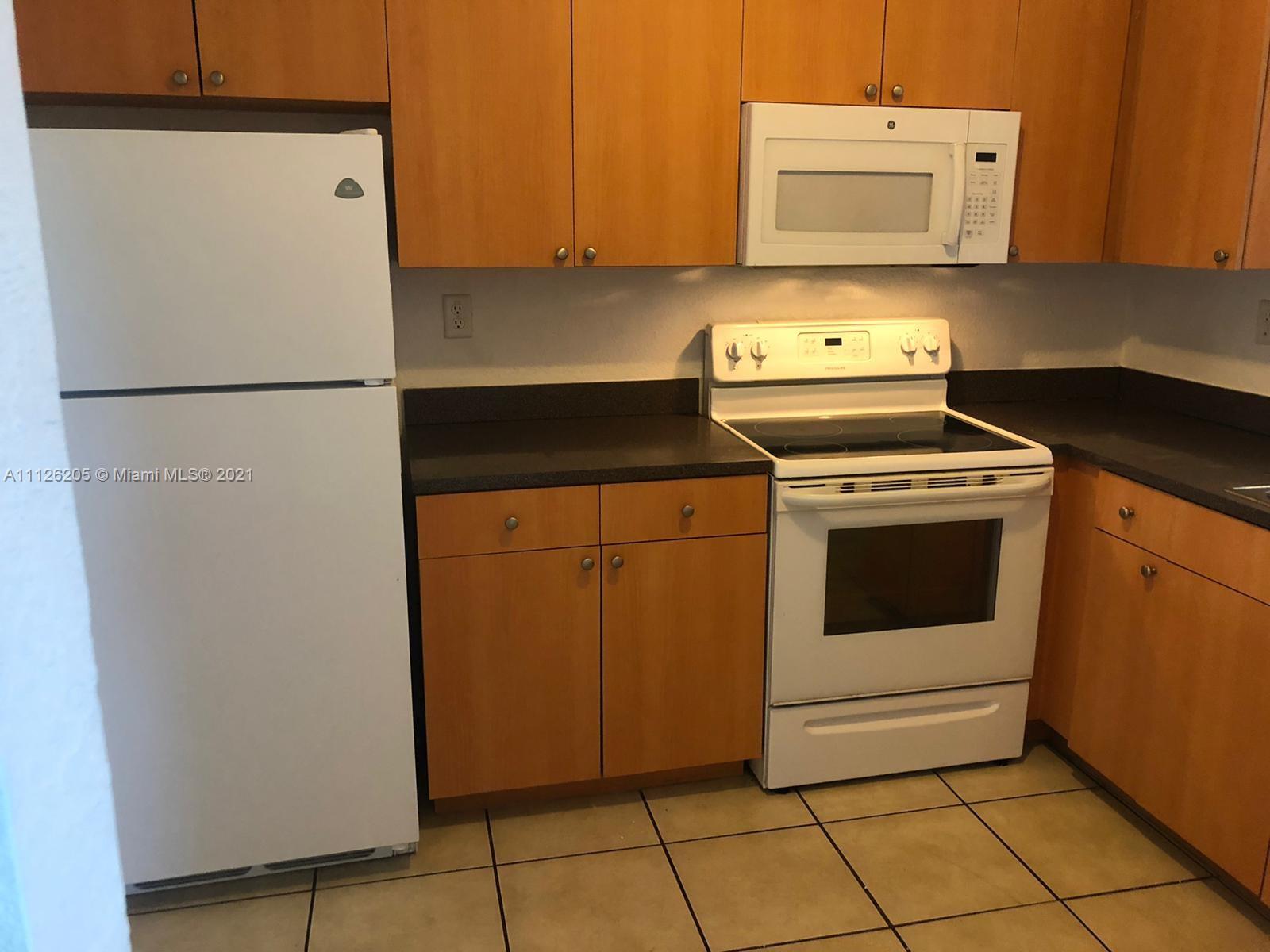 Spacious 1/1 ready for move-in. Unit is located on the second floor. Kitchen features wood kitchen cabinets, granite counter tops, Well maintained apartment. The condominium has a pool, tennis court, playground and laundry facility. Management is on site. Association allows up to 1 dog and 1 cat in each unit. Pets up to 30lbs.