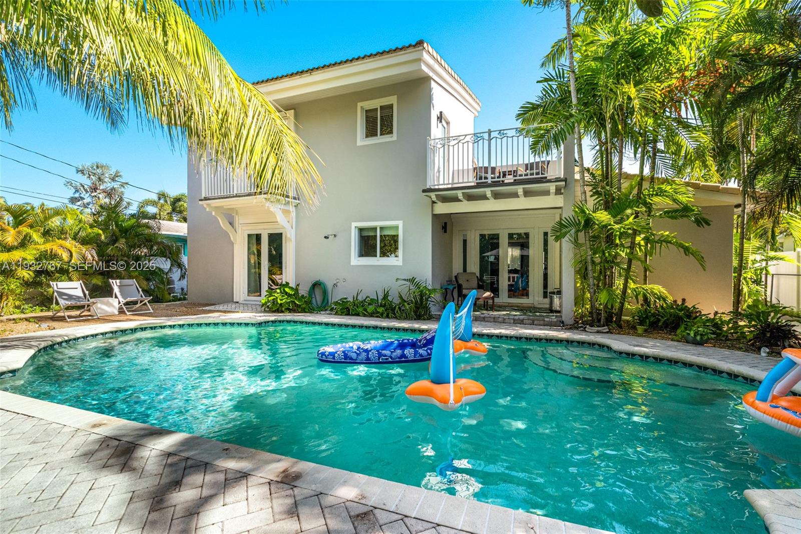 Experience beautiful Florida living in this 3-bedroom plus office, 3-bath home featuring a heated pool and lush tropical setting. The property includes a 1-car garage (under A/C) with hurricane-rated overhead door and side entrance. Freshly painted inside, the home offers updated kitchens and baths, classic terrazzo floors, impact windows and doors, for yours and house best protection.
The welcoming open floor plan flows seamlessly from the breakfast area and family room to a stunning pool and backyard oasis—perfect for entertaining. The primary bedroom features vaulted ceilings and two private balconies. Additional highlights include two A/C units, two water heaters, and a large laundry room.
The fully fenced yard includes a rear alley gate, and the west side of the home offers a paver walkway with discreet storage for trash bins. Located in a charming, walkable neighborhood near a scenic yacht basin and waterfront homes. Walk or bike to the beach—approximately 1.5 miles away.
Enjoy nearby Frost Park, just a short walk, offering tennis and basketball courts, as well as several baseball fields. The city hosts an annual Art & Seafood Festival in the spring and a motorcycle display and competition every January. Minutes from Dania Pointe, featuring popular restaurants and shopping.
A true small-town feel with a beautiful beach, fishing pier, and vibrant community—be sure to explore all that Dania Beach has to offer.