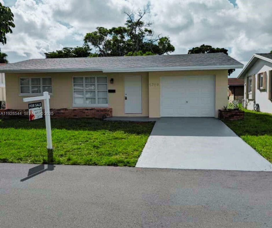 Unique opportunity in Mainlands of Tamarac Lake. Beautifully remodeled home located in a peaceful HOPA-verified 55+ community with great neighbors. This property features 2 bedrooms and 1 bathroom with 1,089 sq ft of adjusted living space, offering a modern and functional layout. Completely updated kitchen and bathroom with contemporary finishes. Large ceramic tile flooring throughout. New appliances. New shingle roof installed in September 2022. Spacious family room and dining area. Screened porch ideal for enjoying the Florida lifestyle. Community offers a clubhouse and pool. Move-in ready with no renovations needed. FHA and VA financing accepted. Restrictions: at least one occupant must be 55 years or older; all others must be 18+. Seller is motivated.