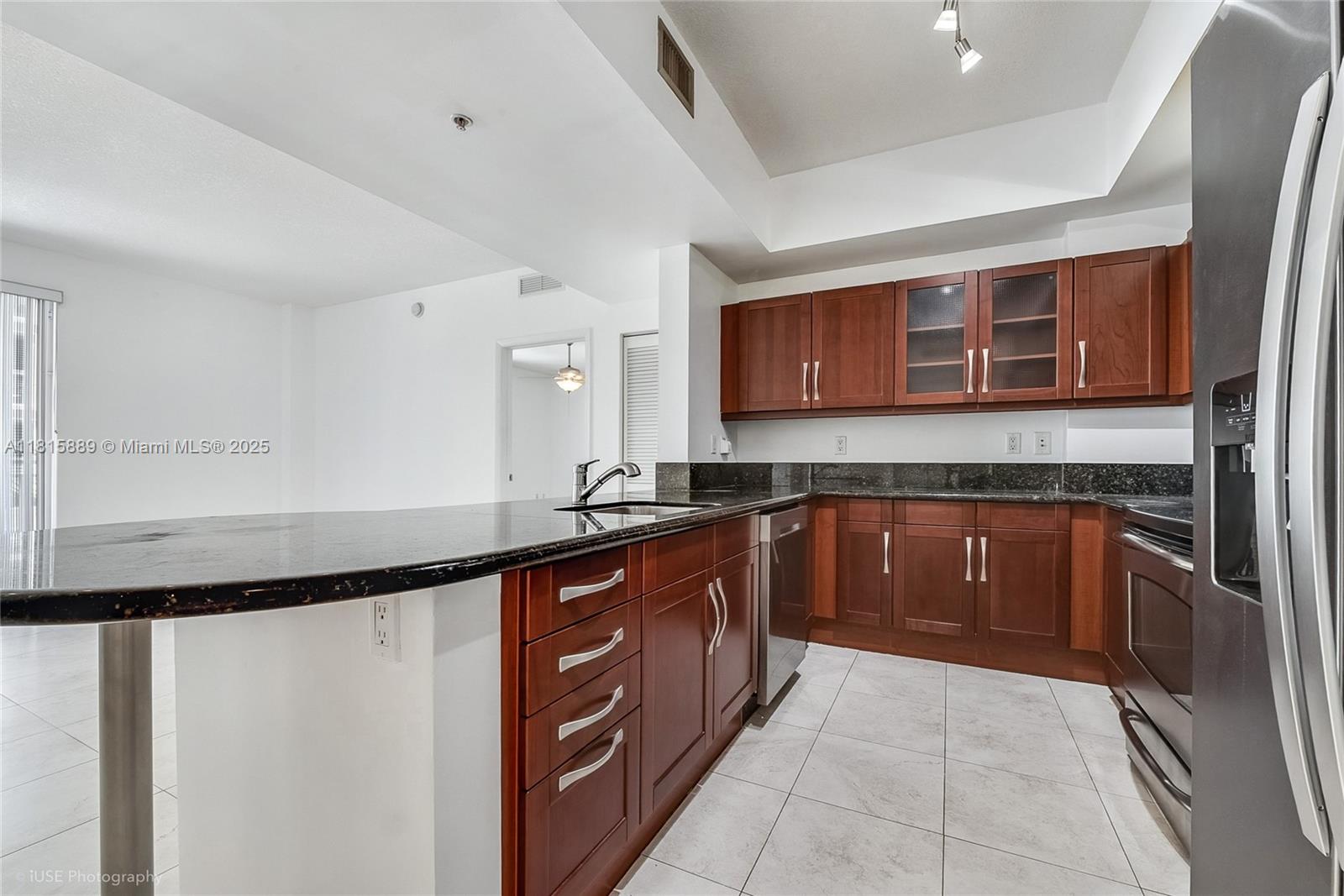 Move in ready Two Bedroom Two Bathroom, Brand new Flooring throughout the unit and Freshly painted!  Condo located in the heart of Downtown Dadeland! Perfect opportunity for buy and hold investors or families. Granite counter tops and washer and dryer in unit! Come get this Gem! **Association Dues include water, Pool, Elevators, Gym and all common areas** Assigned parking space at closing. Special assessment just levied in May. Many facility upgrades imminent. Assessment will be paid by Seller at closing as long as offer price is at or very near asking.