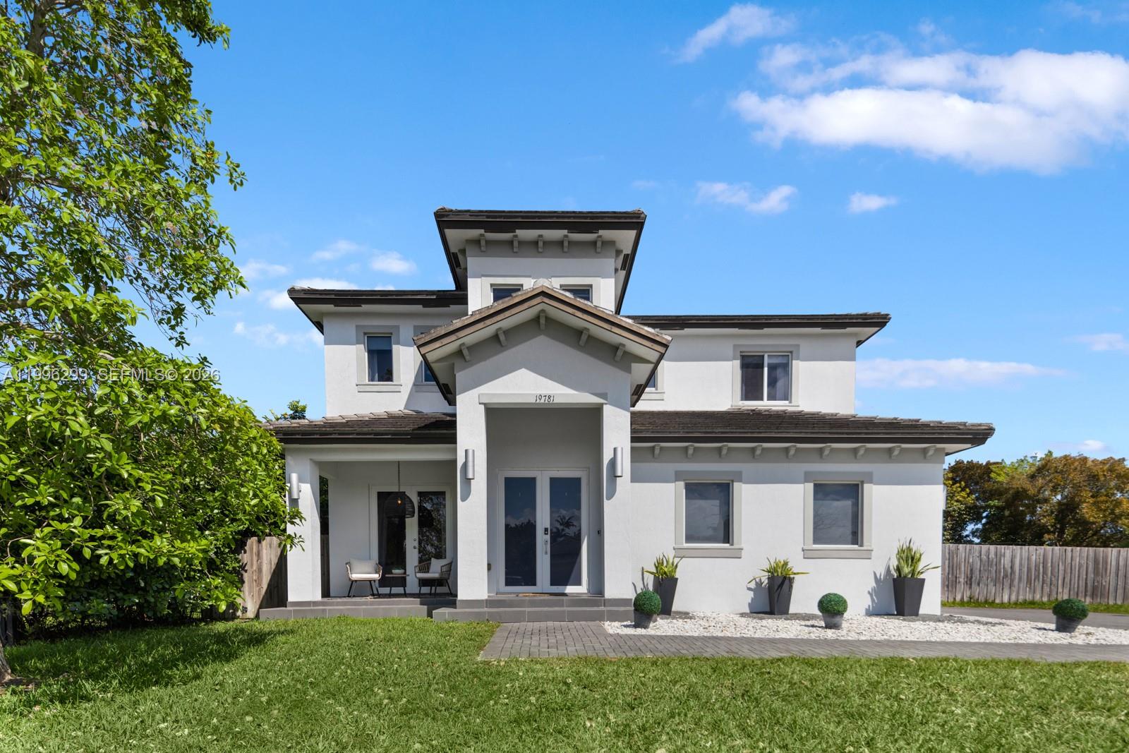 Welcome home! This stunning 4-bed, 4-bath single-family home offers 3,600 sq. ft. on an expansive 14,500 sq. ft. corner lot in the heart of Cutler Bay, just one block from Old Cutler Rd. Built in 2018 with no detail overlooked, 24x24 porcelain tile throughout, 10 ft. ceilings, crown molding and impact windows/doors. Open-concept kitchen features granite countertops, wood cabinetry, SS appliances, built-in wall oven and electric range. One bed/full bath on ground floor with direct access to the backyard pool area, perfect for guests and entertaining. Master suite upstairs boasts dual sinks with separate laundry room. 2-car garage. Enjoy your private oasis with a sparkling pool, outdoor kitchen, and oversized yard with room for your RV and Boat, just 3.5 miles/8 min from Black Point Marina. No HOA!