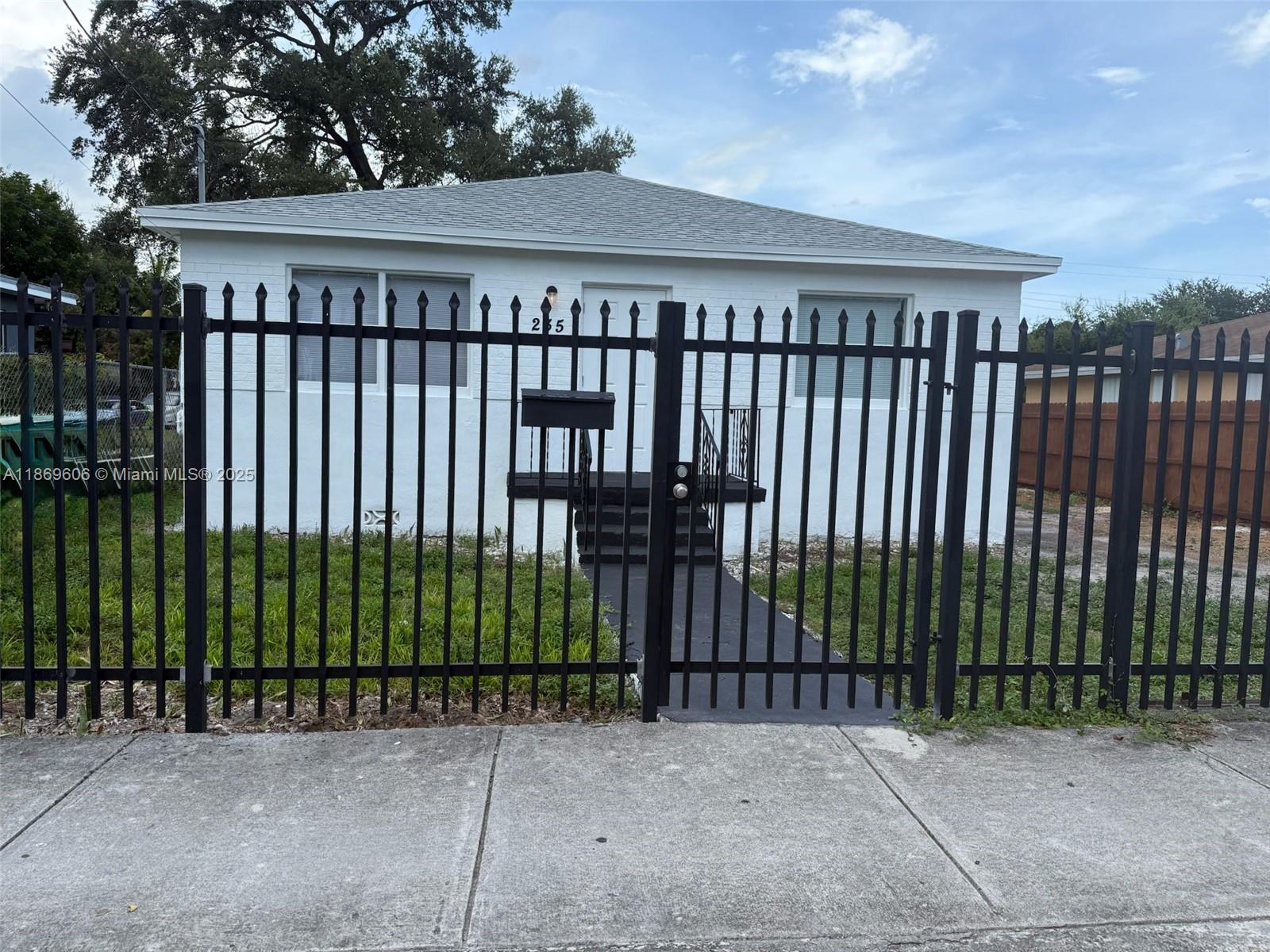 Renovated home featuring 3 bedrooms & 2 bathes, a spacious living room and dining area, perfect for family gatherings. The completely fenced yard offers plenty of space for outdoor activities, gardening, and entertaining. Enjoy convenient driveway parking and a prime location close to Midtown and Wynwood. A wonderful blend of comfort and convenience awaits!