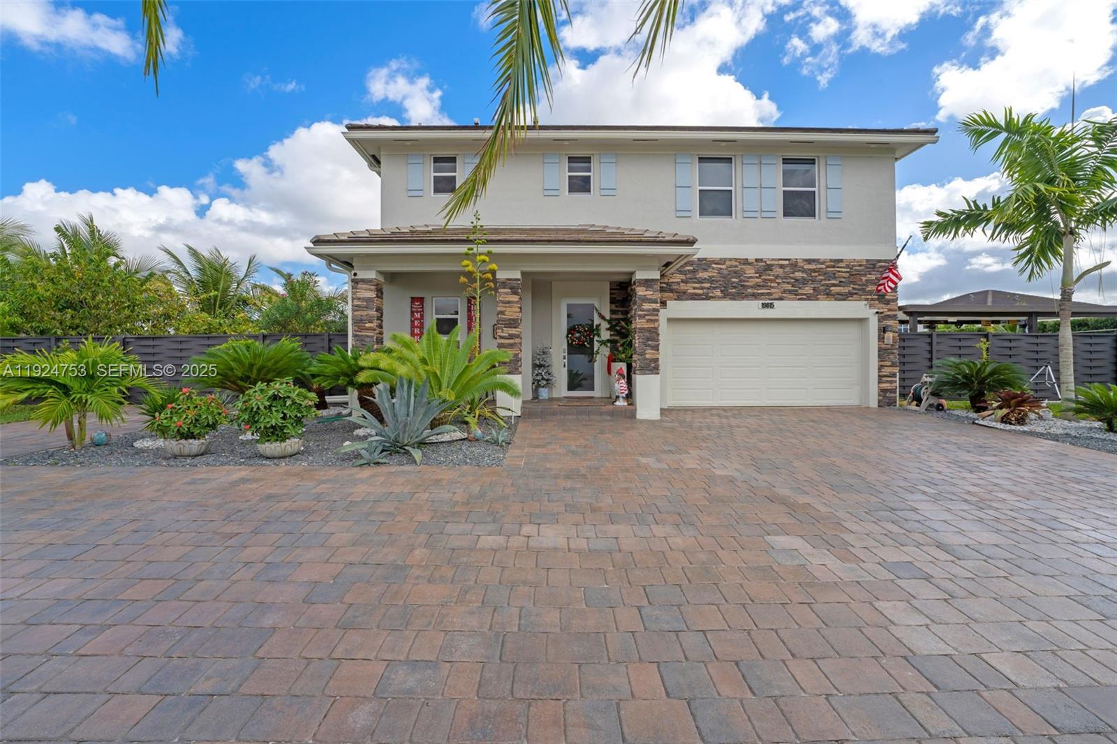 Seller motivated! Step into your own slice of South Florida paradise with this beautifully appointed two-story home in the sought-after Willow Trace community. Built in 2020, this stunning home welcomes you with 4 spacious bedrooms, 3.5 bathrooms, and 2,204 sqft of bright living space designed for both comfort and entertaining. Set on an impressive 14,021 sqft fully fenced lot, the outdoor living experience is nothing short of spectacular. Enjoy your private resort-style retreat featuring a breathtaking 15x30 heated pool/ spa, expansive cement pool deck, 2 aluminum pergolas with insulated roof panels and a lush collection of mature tropical fruit trees including coconut, mango, avocado, guava, and more—creating a serene and private oasis. Inside, the home features a sophisticated open-concept living and dining design that flows seamlessly into the gourmet kitchen, complete with stainless steel appliances, quartz countertops, a statement cooking island, and abundant custom cabinetry. Additional highlights include a charming front porch, elegant paved driveway, 2-car garage, and an ideal layout for a large family and elevated lifestyle living. Perfectly positioned near major highways, shopping, dining, hospitals, and the Miami Zoo, this residence offers the ultimate balance of privacy, elegance, and convenience. No flood zone insurance required, low HOA that doesn't require approval, open community. Schedule your private showing today.