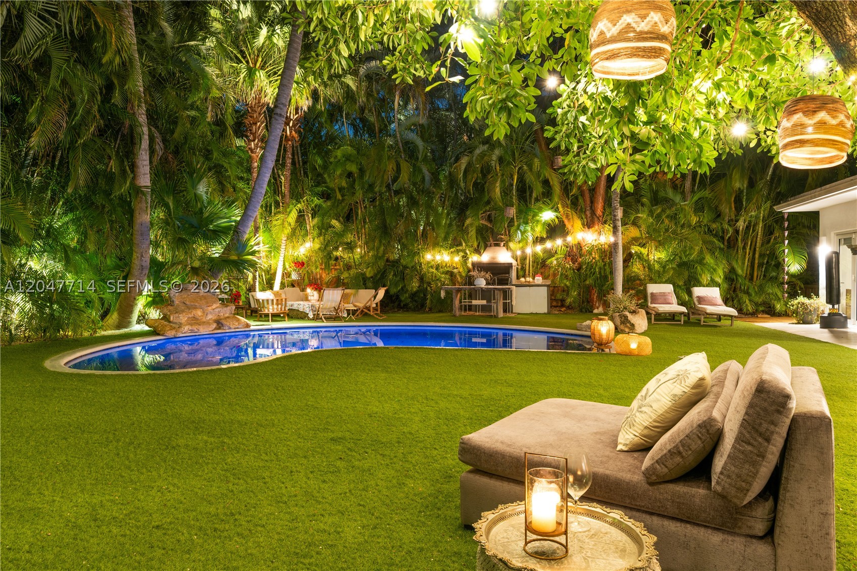 As per tax roll: Actual Area 3,312 Sq.Ft Living Area 3,202 Sq.Ft Adjusted Area 2,911 Sq.Ft Lot Size 12,225 Sq.Ft Welcome to Key Biscayne To a truly unique residence. Beautifully designed home blending Tulum-inspired warmth with Saint-Tropez elegance, ideally located within walking distance to the beach, restaurants, and coffee shops. Features include white concrete floors, high ceilings, and exposed white wood beams that create a bright and airy living environment. The reception/living area and Family room. Direct access to the garden and pool, providing seamless indoor-outdoor living. The main central point of the house is the oversized garden with Lush tropical plants and a Tiki Hut, that is an extension of the house....perfect for outdoor dining and entertaining. The home includes a family room, formal dining area, four en-suite bedrooms, PLUS staff quarters (1/1) conveniently located adjacent to the kitchen. Private and secluded setting, with all main living areas oriented toward the garden and a beautiful mature tree that enhances the homes natural ambiance.