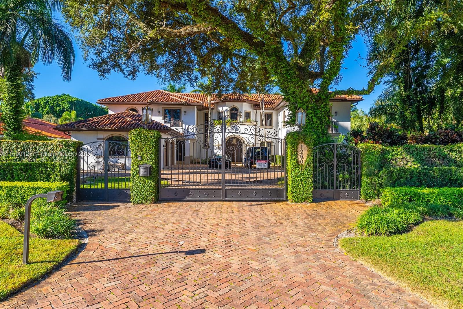 This Mediterranean masterpiece is completely renovated and was designed and faces the famous Biltmore Hotel's Golf course. This extraordinary home includes 6 bedrooms and 1 separate bedroom or guest house, 7.5 bathrooms, dream chef kitchen, an outdoor kitchen with commercial grade equipment, gym/dance/exercise room, game room, office. Beautiful lagoon pool with rock cascade surrounded by tropical lush landscaping, perfect to create the best atmosphere to host family and friends. Balconies and terraces offer spectaculars views of the lagoon pool and scenic landscape and view of the golf course. Once in a lifetime opportunity in this very competitive market to find this lifestyle resort Home with such proximity to all the amenities being offered by the Biltmore Hotel.