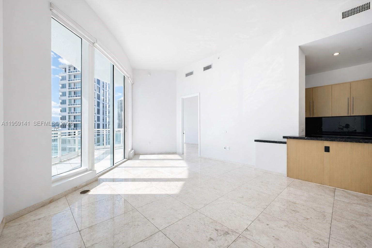 Magnificent bayfront residence at Asia Brickell Key offering 2BR/2.5BA across 1,326 SF. Features include marble floors, 12-ft ceilings, custom walk-in closets, and an expansive kitchen with Miele/SubZero appliances. Private elevator with direct access to the unit. Includes 2 parking spaces and a storage unit conveniently located on the same floor. Amenities include tennis courts, pool, gym, sauna, steam room, basketball/racquetball court, and complimentary guest valet.
