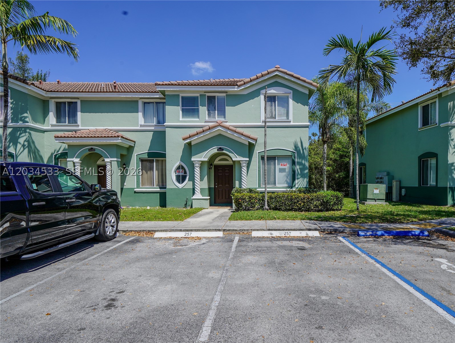 Spacious two story corner townhouse with 3 bedrooms and 3 bathrooms. Features tile floors downstairs, carpet upstairs, stainless steel appliances in the kitchen area, washer and dryer hookups only, walk-in closet, and fresh paint. Enjoy resort style amenities including clubhouse, pools, fitness center, playground, jogging trail, and 24-hour security. Two parking spaces. Conveniently located near the Turnpike, shopping, dining, and Homestead High School. Easy to show!
