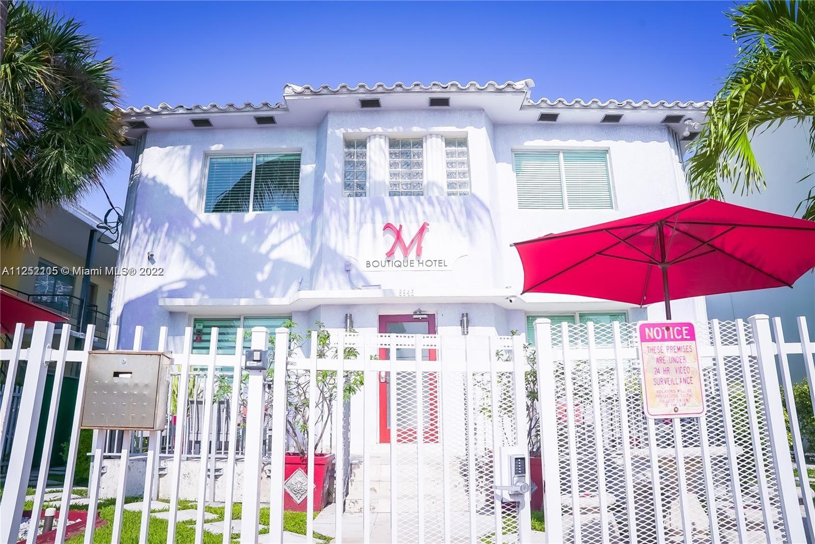 MIAMI BEACH – M Boutique Hotel – Renovated 12-unit apart-hotel in North Beach, offering 11 suites in the main building and a 1BED/1BATH villa in the rear – all with fully equipped kitchens. The property includes a welcome lobby, office, storage room, laundry room, and garden sitting area. Sale includes the real estate and a successful hotel business with very good guest reviews and repeat clientele from all over the world. Renovated in 2011/2012 with impact windows and doors, new split A/C, plumbing and electrical systems, the building is recertified until 2029. Town center zoning allows for additional 15,000+ SF of development in a booming neighborhood with new mixed-use projects planned, two blocks from the beach.