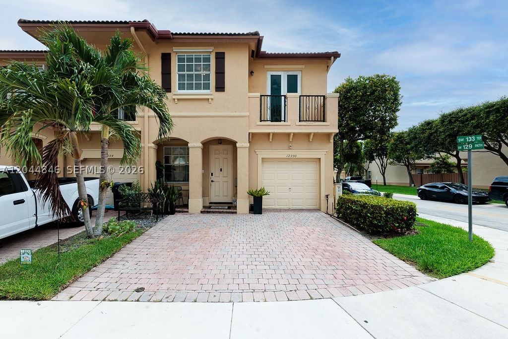 Welcome to this sought-after corner-unit townhome, the largest model in the sought-after Courts at Tuscany West, offering the perfect blend of comfort, style, and convenience. This spacious 3-bedroom, 2-bathroom residence features a bright, functional layout with abundant natural light and a seamless flow throughout the living spaces.

The kitchen is designed for both everyday living and entertaining, showcasing rich cherry cabinetry, a full suite of stainless steel appliances, and ample cabinet and countertop space. Tile and laminate flooring extends throughout the home, providing a clean, low-maintenance finish, while the included washer and dryer add everyday convenience.

As a desirable corner unit, the home enjoys added privacy and a more open feel. Residents of Courts at Tuscany West have access to a variety of community amenities, including a resort-style swimming pool, fitness center, clubhouse, playground, and beautifully maintained common areas.

Ideally located in the heart of Kendall, this home is just minutes from shopping, dining, parks, top-rated schools, and major roadways, including the Florida Turnpike, making commuting throughout Miami-Dade County effortless. Whether you're a first-time homebuyer, downsizing, or looking for an excellent investment opportunity, this move-in ready residence offers exceptional value in a prime location.