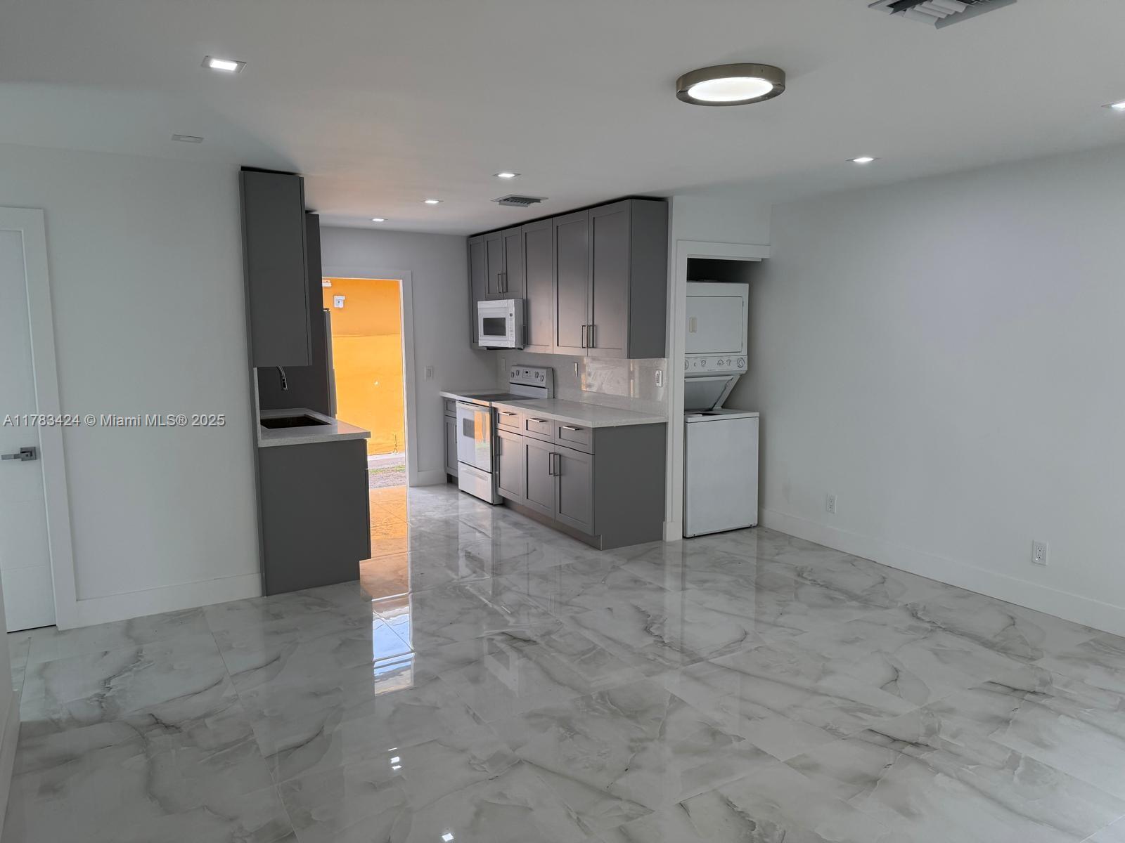 This beautifully upgraded 2-bedroom, 1-bathroom apartment in Hallandale Beach is just minutes away from Hallandale Beach, Hollywood Beach, and Fort Lauderdale Airport. Featuring brand-new interiors, a spacious layout, and in-unit WASHER AND DRYER, it’s the perfect place to call home. The apartment also includes private parking, with utilities like water, sewer, and trash removal covered by the landlord. Located near dining, shopping, and entertainment hotspots, it offers both comfort and convenience. Move-in ready and waiting for you—schedule a viewing today and make this your new home! The unit comes with 4 PARKING SPACES, BRAND NEW A/C UNIT  YOU MUST SEE !!!!!!!!!!!