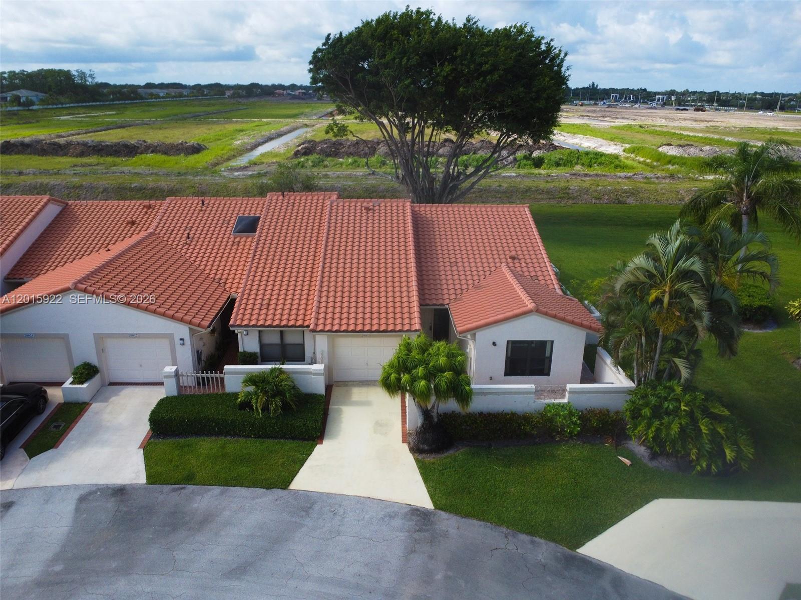 Beautifully maintained 3-bed, 2-bath villa located in the gated Brentwood of Boca community. This inviting residence offers soaring vaulted ceilings, a spacious split-bedroom design, impact windows, and an attached 1-car garage. Enjoy easy, low-maintenance living with HOA-covered cable, security, and lawn care, plus access to community amenities including a pool, spa, fitness center, tennis courts, and clubhouse. Ideally situated near Town Center Mall, Sugar Sand Park, dining, beaches, schools, and major commuter routes.