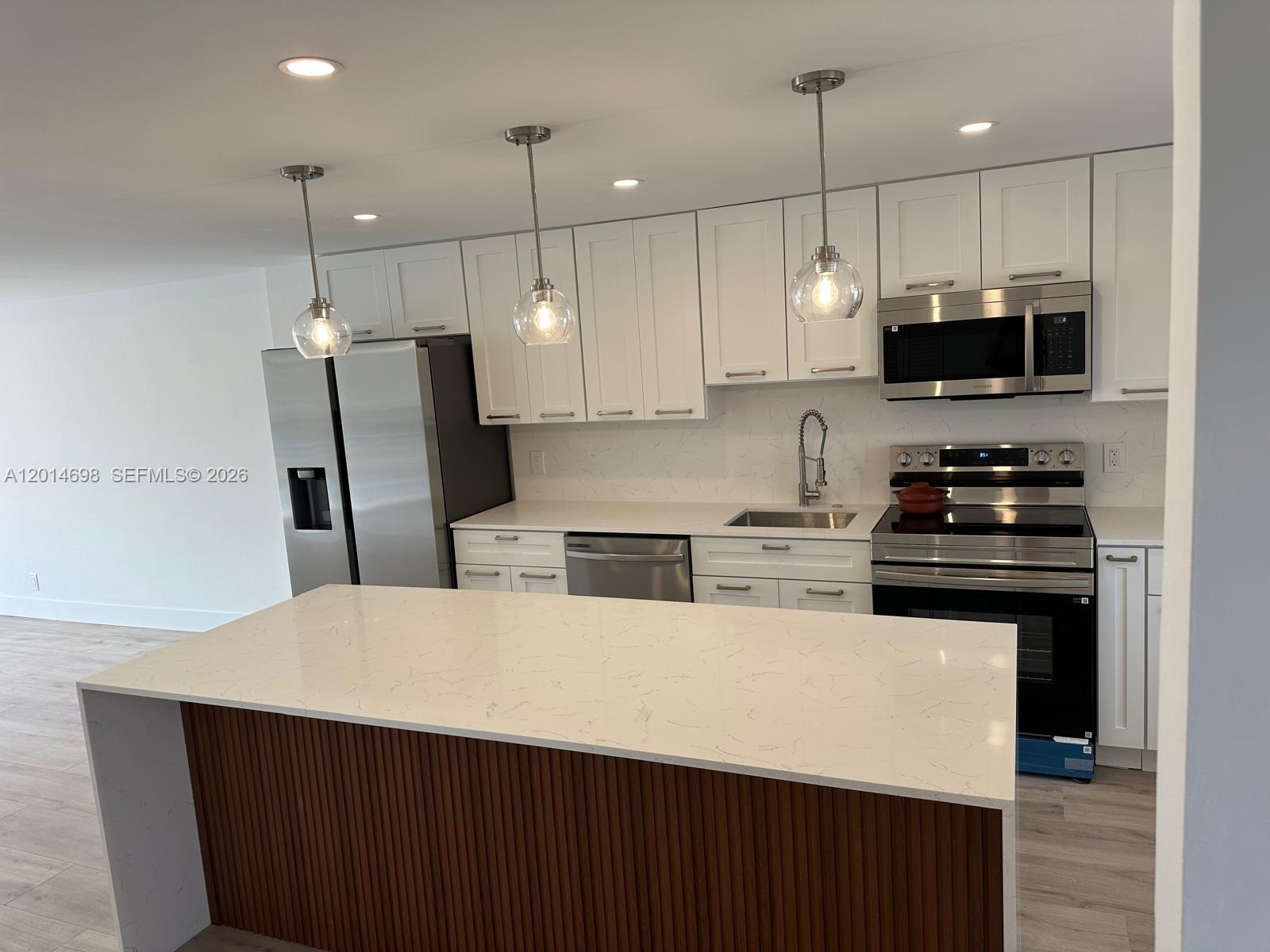 Welcome to this spacious 1-bedroom, 1.5-bath condo in The Danian's, ideally located east of US-1 and just one mile from the beach. This light-filled home features luxury vinyl flooring upgraded kitchen and bath, and a private screened balcony overlooking the lake and the pool. All appliances are brand new and some of the windows are impact resistant. Enjoy resort-style living with a heated pool, fitness center, sauna, clubhouse, shuffleboard, library, and social rooms. Walk to Dania Pointe, Publix, shopping, and local favorites like Jaxson’s Ice Cream. Just minutes to Dania Beach Casino and Fort Lauderdale–Hollywood International Airport. HOA includes water, sewer, trash, insurance, security, parking, and full amenities. All ages welcome. Condominium has reserves. A perfect blend of comfort, convenience, and South Florida lifestyle!