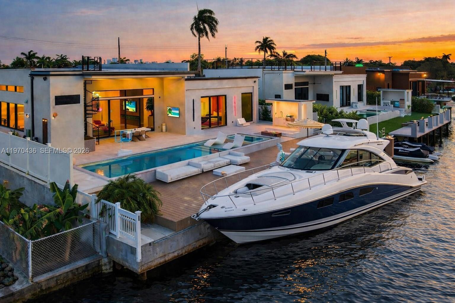 Stunning 4BR/4.5BA waterfront home in gated Bal Harbour. Nearly 3,300 SF of open-concept living with soaring 16-ft ceilings and floor-to-ceiling glass that makes the home live much larger. Chef’s kitchen with high-end finishes, spacious living areas, and abundant natural light throughout. 80 ft of ocean-access frontage on the Middle River with private dock. Resort-style backyard featuring summer kitchen, heated pool, spa, and beautiful water views. Ideally located minutes to Fort Lauderdale Beach, Galleria Mall, and Las Olas, with walkability to Whole Foods, Trader Joe’s, and more. Luxury coastal living at its finest.