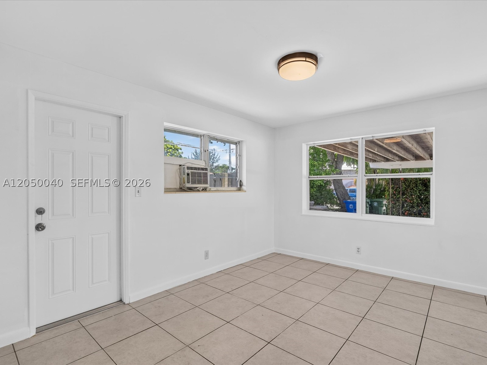 Location, Location, Location! Live just steps from A1A and world-famous Fort Lauderdale Beach in this beautifully maintained 2-bedroom, 2-bathroom home.

This spacious residence features an open and inviting layout with tile flooring throughout, stainless steel appliances, and a generously sized primary suite with its own private entrance for added privacy and flexibility. Enjoy the convenience of an in-unit washer and dryer, making everyday living effortless.

Step outside to a fully fenced backyard, perfect for relaxing, entertaining, or enjoying South Florida's beautiful weather. Ideally located just minutes from the beach, waterfront restaurants, shopping, nightlife, and parks, this home offers the best of Fort Lauderdale living.