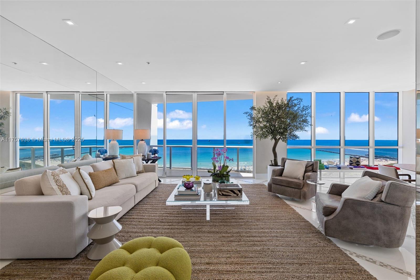Professionally designed and decorated ocean front residence with private elevator foyer, 3 bedrooms plus a den (reconfigured as a in-suite) 4 full baths, half bath and media room. Open kitchen and spacious living areas, 3 balconies with ocean views.Continuum on South Beach offers 13 acres of ocean front amenities such as beach and pool service, restaurant for residents, 3 tennis courts with a pro-shop, 2 lagoon shaped pools, lap pool, state-of-the-art gym and spa with a variety of classes, concierges, valet and security. Two combined units totaling 3,497 sq ft.