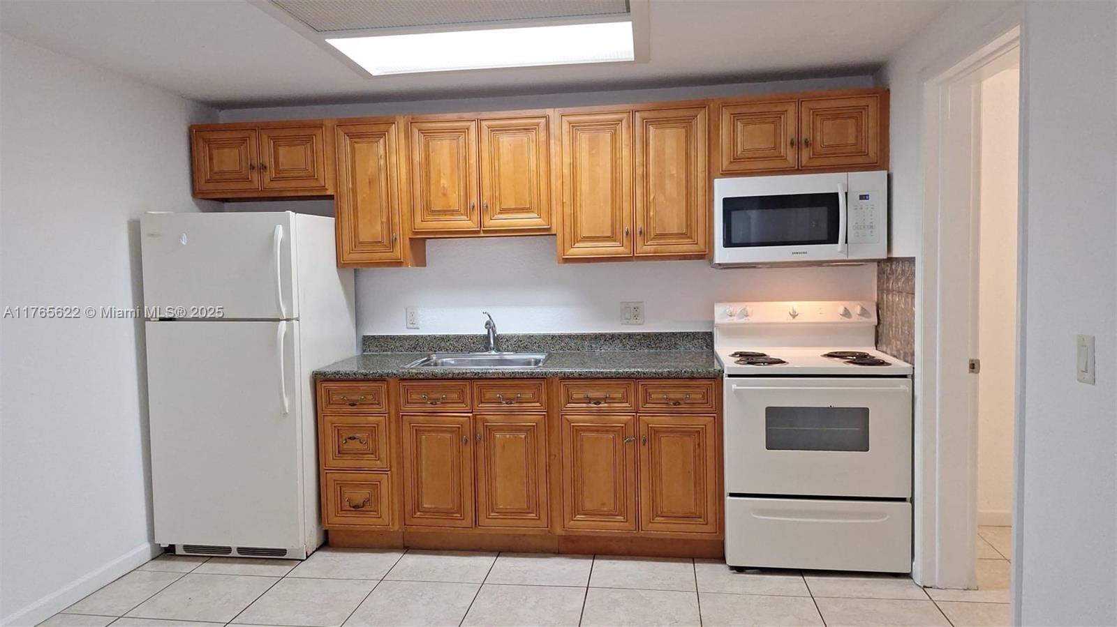 Nice updated one bedroom villa townhouse, turn key ready to move, Freshly painted. Corner unit with ceramic and laminated floor. Kitchen with granite countertop. Large Laundry room with washer and dryer and heater. Additional attic space. As per Condo Rules, minimum Credit score 650 per adult living on the property.