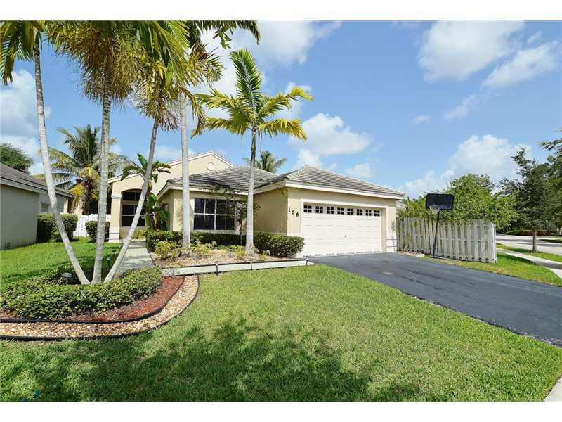 Absolutely gorgeous 3bdrm/2bth home in the Lakes on a quiet cul-de-sac*Upgraded kitchen with granite countertops and newer appliances*Neutral 18" ceramic tiles in all main living areas carpets in bedrooms*Beautiful paved area in patio with extra room to p lay*Part of garage was converted -can be used as playroom. A Must SEE!