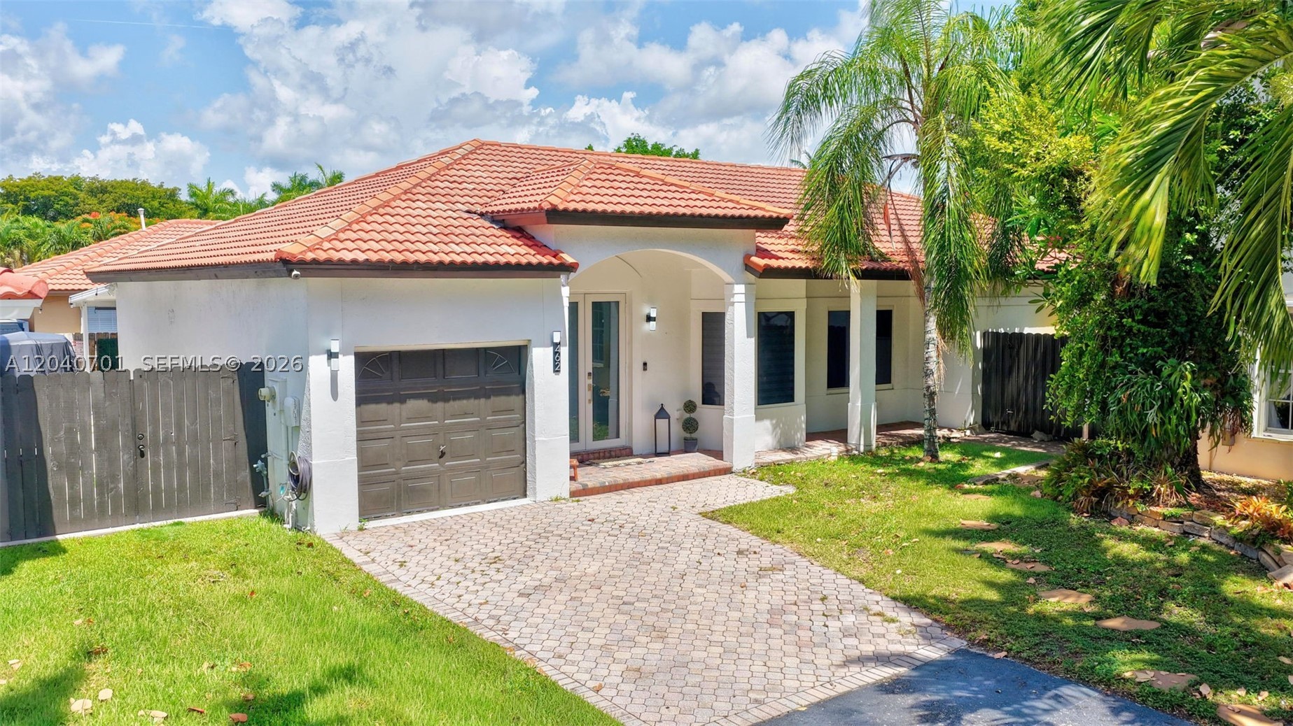 Beautifully remodeled home located in the highly sought-after community of Monterey Lakes/ Lakes by the Bay, Cutler Bay. This stunning residence is located in a cul-de-sac, and features modern upgrades throughout, offering the perfect blend of style, comfort, and functionality. Enjoy spacious living areas, an updated kitchen with contemporary finishes, beautiful bathrooms, and a covered patio terrace with an oasis-like outdoor space ideal for entertaining or relaxing. Home features 2018 A/C, new impact windows and doors, recess lighting throughout and modern lighting fixtures and contemporary design. Nestled in a desirable neighborhood with access to excellent amenities, parks, schools, shopping, and major roadways, this home is a wonderful opportunity to enjoy South Florida living at its finest.
Note: Actual living square footage is 1806 as the garage has been converted to a 4th bedroom with a closet and it is being used as an office by the owners.  Schedule your showing, this home won't last.