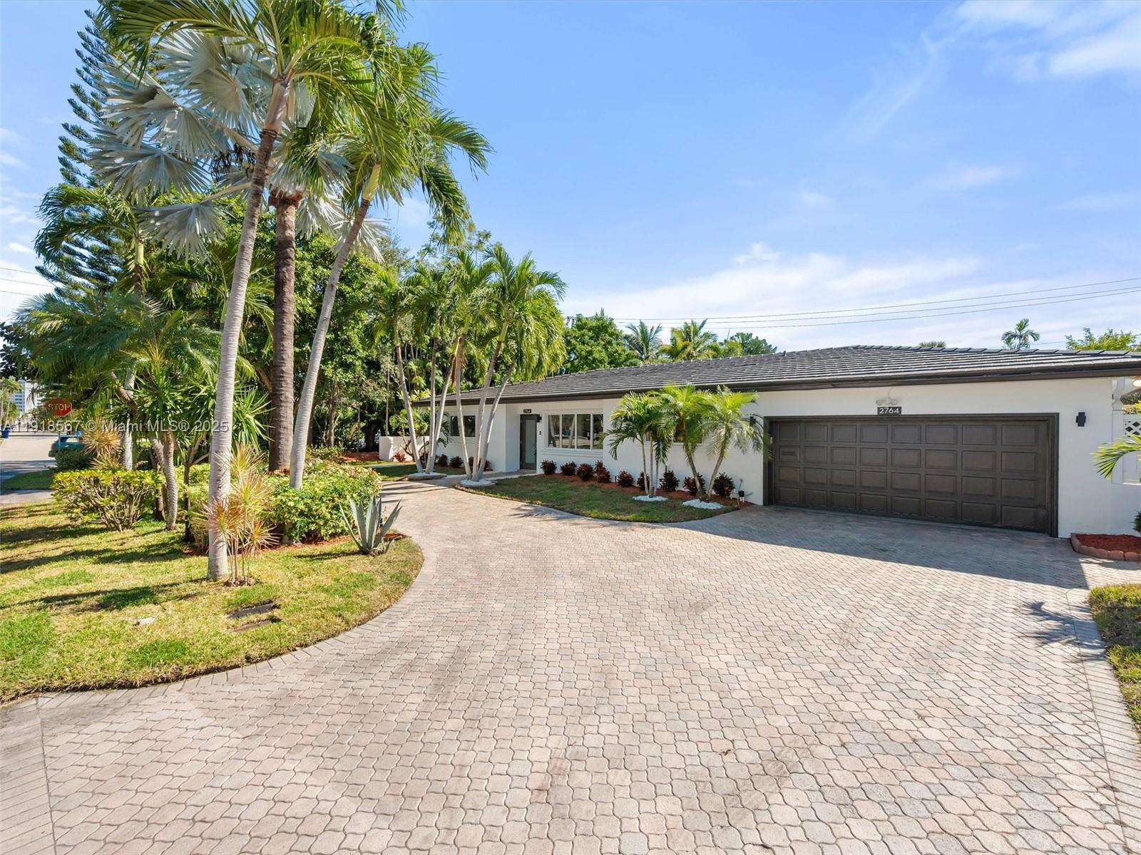 Discover this stunning home featuring a sparkling private pool, spacious covered terrace, and brand-new porcelain flooring throughout. The updated kitchen and bathrooms offer modern elegance with quartz countertops, custom cabinetry, and stainless steel appliances. Enjoy peace of mind with impact windows and convenience with a location just minutes from Fort Lauderdale Beach, downtown, top restaurants, and shopping.

Perfect for entertaining and everyday luxury—this home truly has it all!