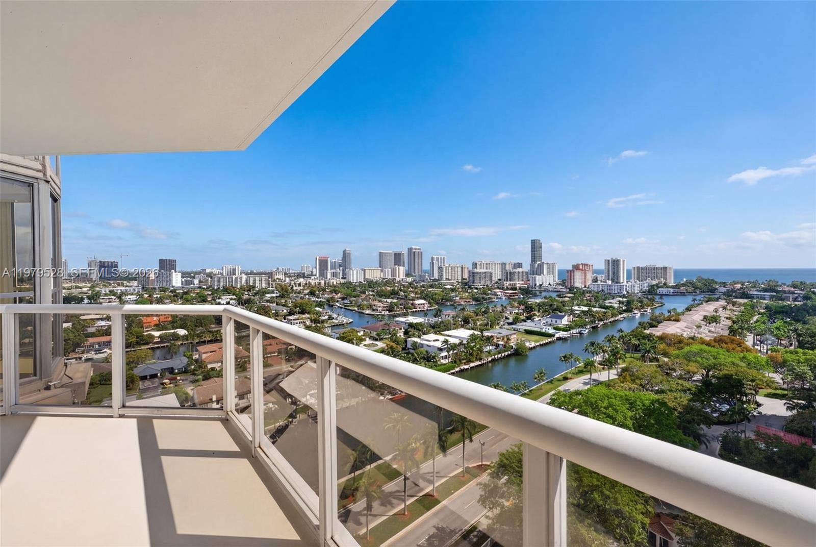 Residence 1802 showcases breathtaking high-floor water views overlooking the Waterways and Intracoastal surroundings, filling the home with natural light and a true waterfront ambiance. The residence is currently configured as a spacious 2-bedroom layout, thoughtfully converted from the original 3-bedroom to create a larger living and entertaining space. A rare offering in the building, the unit includes three parking spaces and a private storage unit—highly valuable features seldom available together. Harbor Towers offers a full-service waterfront lifestyle with amenities including a marina, waterfront pool, fitness center, tennis courts, 24-hour security, and beautifully maintained grounds. Ideally located in Aventura’s highly desirable Waterways community, residents enjoy walking distance to the Waterways Marina, waterfront restaurants, cafés, boutique shops, parks, and scenic walking paths. Just minutes from Aventura Mall, Gulfstream Park, and the beaches, Residence 1802 represents exceptional value and a rare opportunity to own in one of Aventura’s most sought-after waterfront communities.