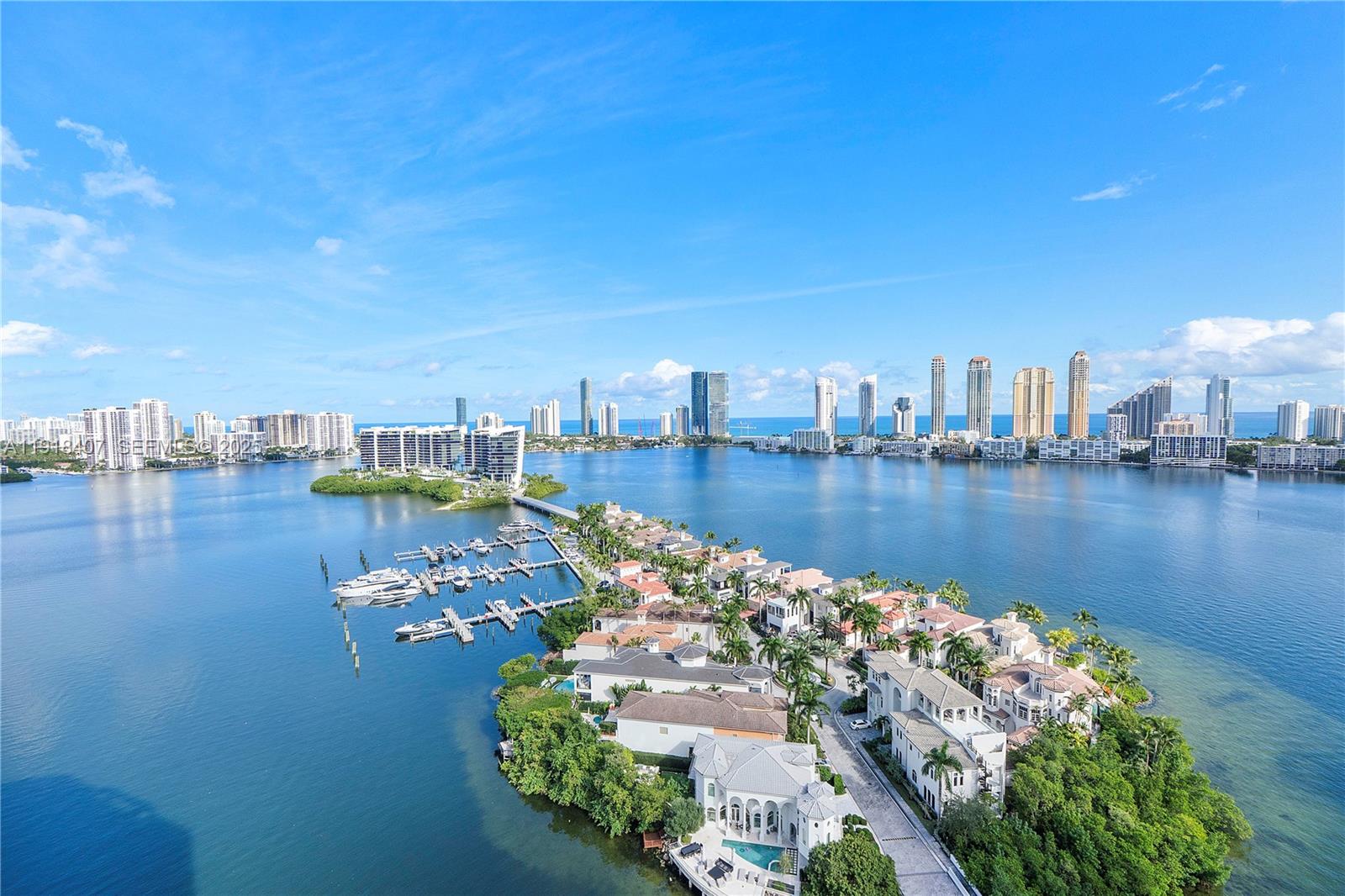 Step into a stunning, fully redesigned waterfront residence—just completed by a luxury interior designer and offered beautifully furnished—this is the “06” line like you’ve never seen it before. Featuring 4 bedrooms, 3.5 baths, and 3,528 SF of open, sun-filled living, this home impresses from the moment your private elevator opens into a grand foyer. Every detail has been elevated with ,premium finishes, and a showpiece gourmet kitchen perfect for both daily living and entertaining. The primary suite delivers a true retreat with expansive walk-in closets and a spa-level bath. Beautiful design wood floors flow through the main living areas, with carpeting  in the bedrooms for a refined contrast. Two large private terraces capture sweeping panoramic bay, Intracoastal, and ocean views—breathtaking by day and extraordinary at night. Bella Mare elevates the lifestyle with a theater room, state-of-the-art fitness center, resort pool, valet, concierge, wine cellar, coffee bar, and business center. Within the exclusive Williams Island community, enjoy world-class amenities including a celebrated spa, three restaurants, a 16-court tennis club, deep-water marina, playground, and courtesy transportation. This is turnkey luxury living at its highest level—move in and enjoy from day one.