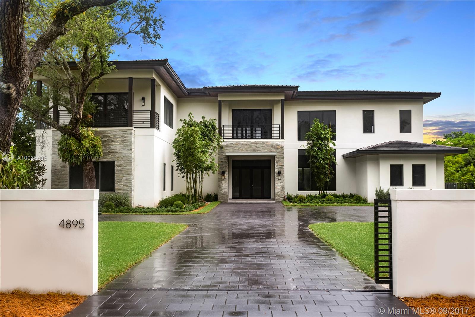 Majestic new corner Ponce Davis estate. Spectacular finishes complementing the gracious floor plan with oversized rooms. Second floor master wing features a sitting room, marble-clad bathrooms and massive walk-in closets. The pool, patios and gazebo create a resort-like outdoor retreat.