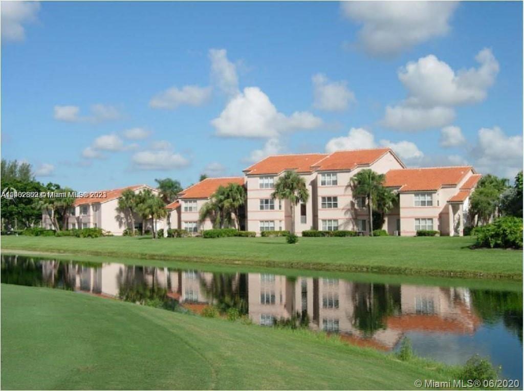 WOW...BEAUTIFULLY UPGRADED 2 BEDROOM CORNER UNIT IN A GREAT COMMUNITY, VERY BRIGHT AND SPACIOUS, HIGH VAULTED CEILINGS, OPEN KITCHEN WITH GRANITE COUNTERS AND STAINLESS STEEL APPLIANCES.BRAND NEW LAMINATE, FRESHLY PAINTED, BRAND NEW BLINDS, WASHER, AND DRYER INSIDE. THIS CENTRALLY LOCATED COMMUNITY OFFERS LOTS OF AMENITIES: POOLS, SPA, TENNIS, AND EXERCISE ROOM. ASSOCIATION REQUIRES A 620 MINIMUM CREDIT SCORE; AS PER HOA: UP TO 2 PETS  ARE ALLOWED 20 lbs EACH.