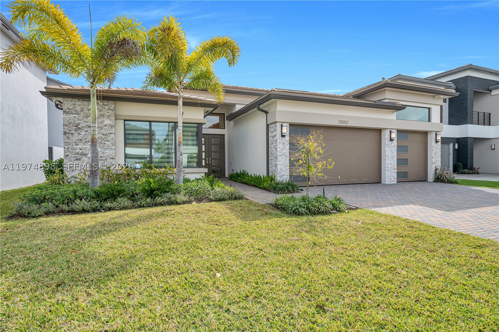 Welcome to 20052 Pacific Dunes Dr — a move-in ready, Designer finished and fully furnished 2024 construction in Boca’s premier Lotus Palm community. This stunning 4BR + den residence features a desirable west-facing front exposure, refined high-end finishes, and a durable concrete S-tile roof. With over 4,100 total square feet, the thoughtfully designed layout offers expansive living spaces and sits on a generous lot with ample room to entertain. 

Boasting over $200,000 in custom designer finish upgrades, this home has been thoughtfully elevated well beyond builder grade. The large, beautifully appointed kitchen is ideal for entertaining and everyday living, showcasing elevated materials, modern detailing, and a clean, sophisticated aesthetic throughout.

The luxurious primary suite serves as a private retreat, featuring a spa-inspired bathroom with dual vanities, sleek contemporary finishes, and an oversized spa shower designed for a truly relaxing experience. A separate laundry room adds everyday convenience and functionality.

Enjoy resort-style amenities in a prime Boca Raton location — the perfect blend of comfort, style, and sophistication. Property is Fully furnished.