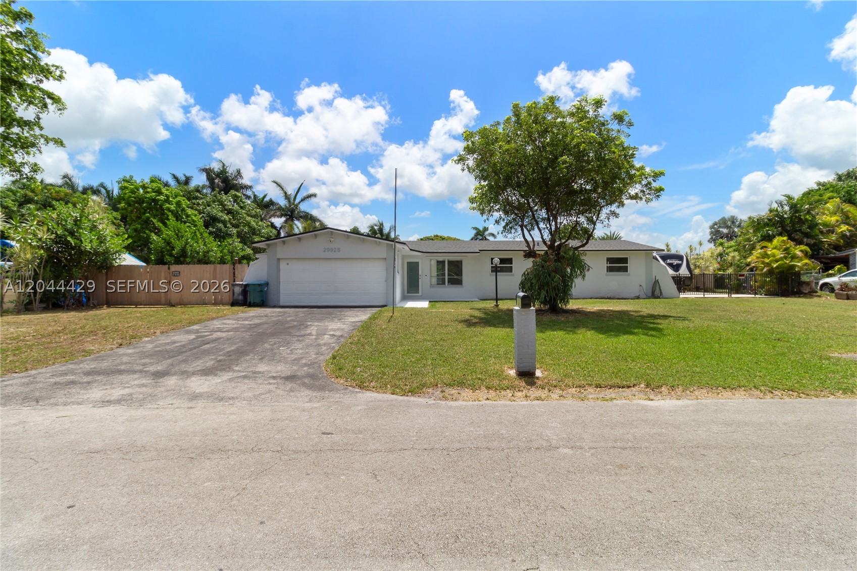 Opportunity awaits on this oversized 15,000 sq. ft. lot in Homestead! This 4-bedroom, 2-bathroom single-family home offers the space, privacy, and flexibility that's becoming harder to find. Featuring a **new roof**, abundant natural light, and porcelain tile throughout, the home provides a warm and inviting atmosphere with endless potential to make it your own.

Step outside to your private backyard retreat featuring a sparkling pool and an impressive collection of mature fruit trees, including lychee, coconut, banana, mango, and almond. An expansive concrete slab offers ample space for multiple vehicles, a boat, RV, or future outdoor additions. The property also presents the potential for an efficiency or private in-law quarters, providing added flexibility for extended family or additional income opportunities. The septic tank was recently cleaned, offering added peace of mind.

Whether you're looking for room to grow, space to entertain, or a peaceful place to call home, this property delivers. Conveniently located near shopping, dining, schools, and major roadways while still offering the privacy and charm Homestead is known for.