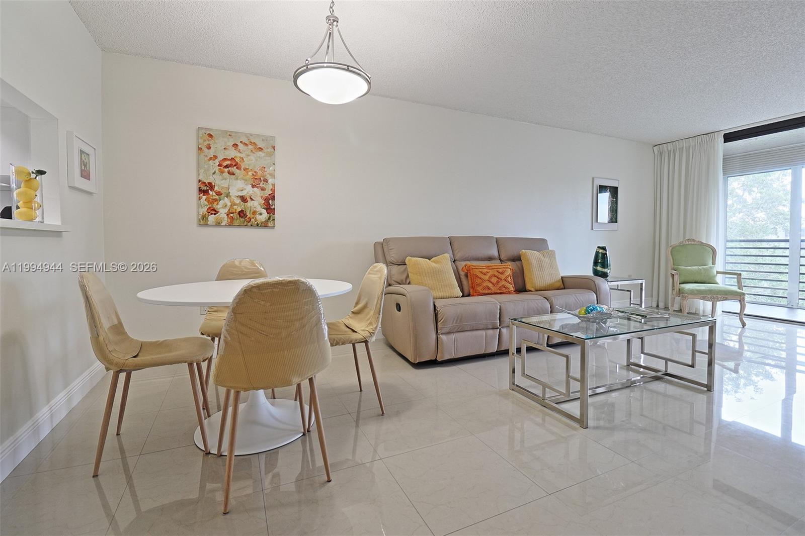 Resort-style 55+ community. Move-in ready unit featuring a spacious kitchen with a full appliance package, new washer/dryer, tankless water heater, and new flooring throughout. Conveniently located steps from the assigned parking space and elevator. Garden-view layout with 1 primary bedroom, 2 full bathrooms, and a converted den. Maintenance includes shuttle bus, water, cable, internet, fitness center, billiards, BBQ/picnic areas, fishing pier, hobby room, heated pool, cabana, Jacuzzi, sauna, tennis courts, shuffleboard, pickleball, movie nights, bingo, and extra storage. Prime location near Pembroke Lakes Mall, Memorial Regional Hospital, Walmart, Publix, Trader Joe’s, Fresh Market, C.B. Smith Park, restaurants, and more. ASSOCIATION REQUIRES 20% DOWN, NO RESIDENTS UNDER 18, & NO RENTALS.
