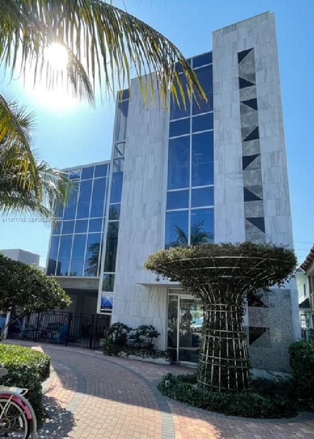 Rare opportunity to acquire a freestanding, three-story signature office/mixed-use building with sweeping waterfront, marina and stunning skyline views in the heart of Lauderdale-by-the-Sea. Designed as a flagship corporate headquarters, this Class-A quality property features a lobby, floor-to-ceiling glass, balconies on every level, elevator service, and a refined granite and marble exterior.

With just over 3000 SF per floor, the property offers flexible, non-bearing interiors for custom build-out. The third floor is zoned for office or residential use (up to two residences) with access to a rooftop deck boasting city and partial ocean views. Built with a reinforced foundation and roof to accommodate a future fourth floor, the building also includes a kitchen, multiple bathrooms, 11 private parking spaces, ground-level patio, and immediate exposure on high-traffic Commercial Boulevard—east of the bridge and steps to the beach, dining, and shops.

Recently certified under Florida’s 25-year inspection, this exceptional, owner-built property combines timeless architecture, expansion potential, and an unmatched location across from a multi-million-dollar yacht marina. Ideal for a corporate headquarters, mixed-use investment, or live-work vision.