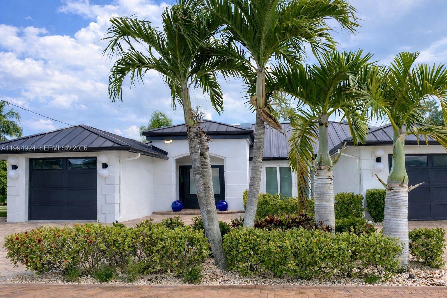 Experience elevated waterfront living in this beautifully remodeled Gulf-access residence, ideally located in one of Cape Coral’s most desirable boating communities. Perfectly positioned on a wide mid-canal lot with direct access to the Gulf of Mexico, this property offers a rare combination of privacy, long water views, and the ultimate Florida lifestyle.

This home has been meticulously upgraded, featuring a new metal roof, sleek modern flooring throughout, and high-end finishes that create a bright, clean, and truly move-in-ready space. The open-concept layout is thoughtfully designed to maximize natural light while seamlessly blending indoor and outdoor living—perfect for both everyday comfort and effortless entertaining.

Step outside to your private lanai and pool area, where serene canal views provide the perfect backdrop for relaxing mornings or sunset gatherings. Boating enthusiasts will love the direct Gulf access and prime canal positioning, offering quick and easy navigation to open waters.

Whether you're searching for a primary residence, a seasonal retreat, or a high-potential investment property, this home delivers an exceptional blend of location, style, and waterfront living.
