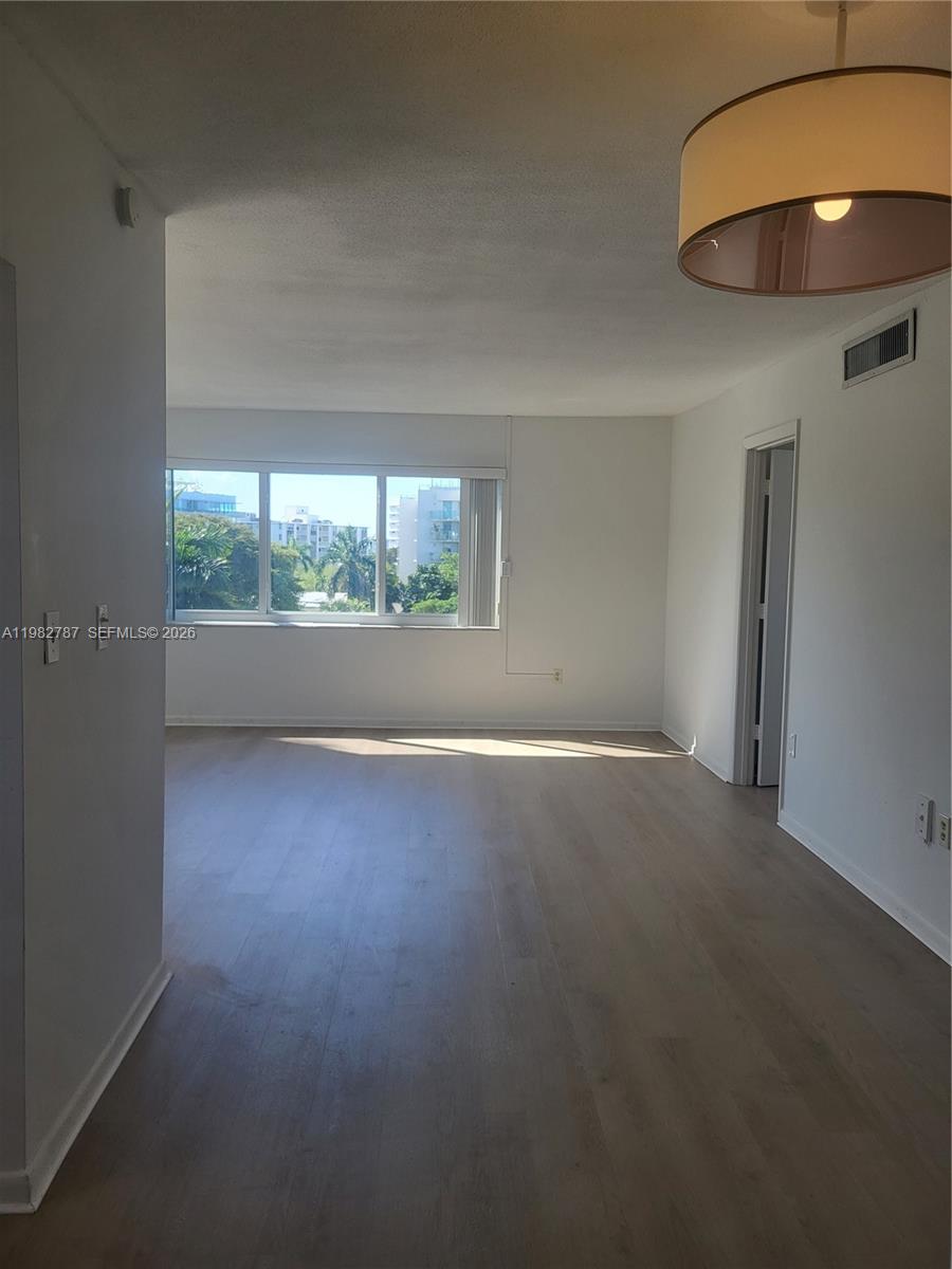 Top floor corner apartment with lots of light and new impact windows. Large 2 bedrooms, 2 full bath. 929 sq ft. Boutique small building with only 3 apartments per floor (only 12 units total). Unit is updated and move-in ready. Apartment has East, South and west and has sunrise and sunset views. Lots of closet space. Secure lobby. Walking distance to famous Bal Harbour Shops and restaurants. 1 assigned parking and guest parking is available in front of building. Newly renovated pool area. Building will be painted in April. Seller Financing is available with 35% down.