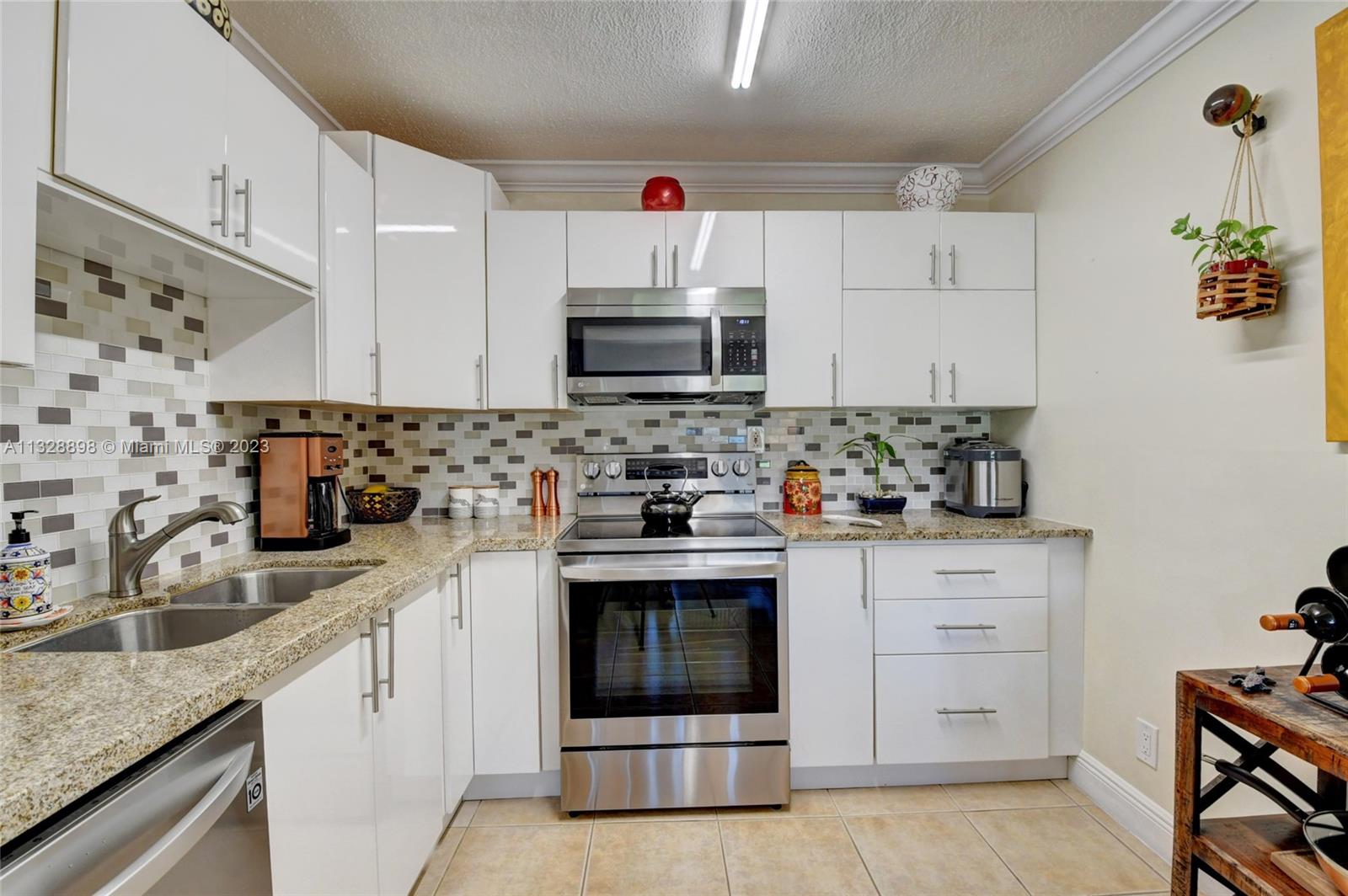 KINGS POINT BURGUNDY COND - Residential